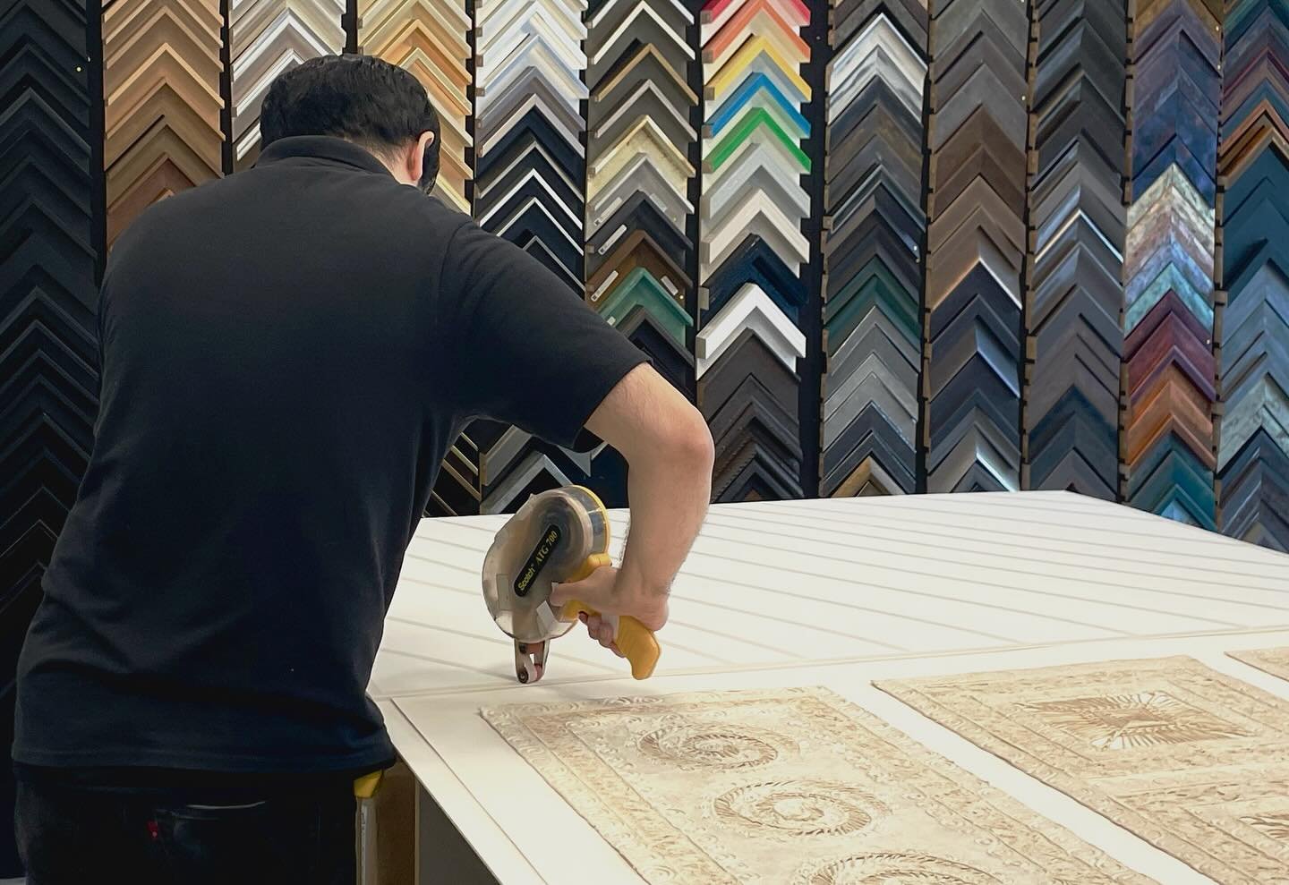 It&rsquo;s Monday! We are open 10am-7pm and are ready to work with you on all of your creative framing projects! 

Pictured here is our talented framer, Luis, putting together an extra large piece of amate paper art from Mexico. 
.
.
.
.
.
#customfra
