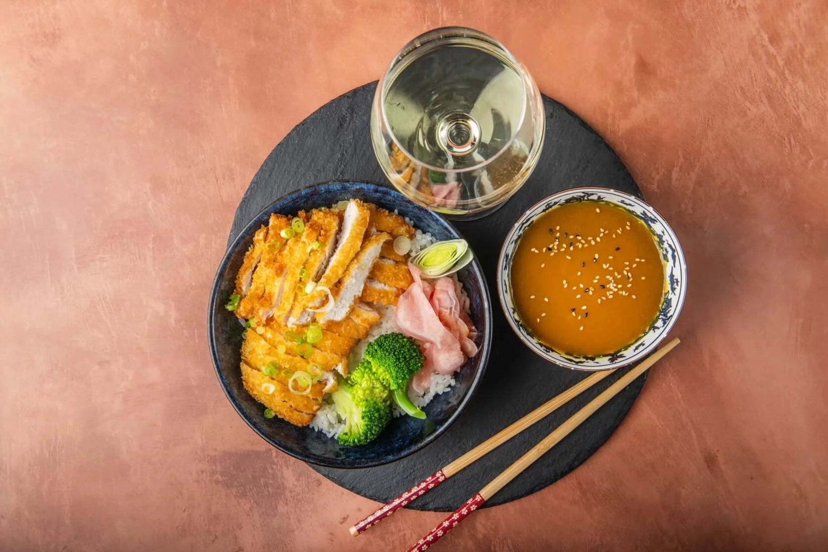 Chicken katsu rice bowl with curry sauce and broccoli at Sushi & Salad.
