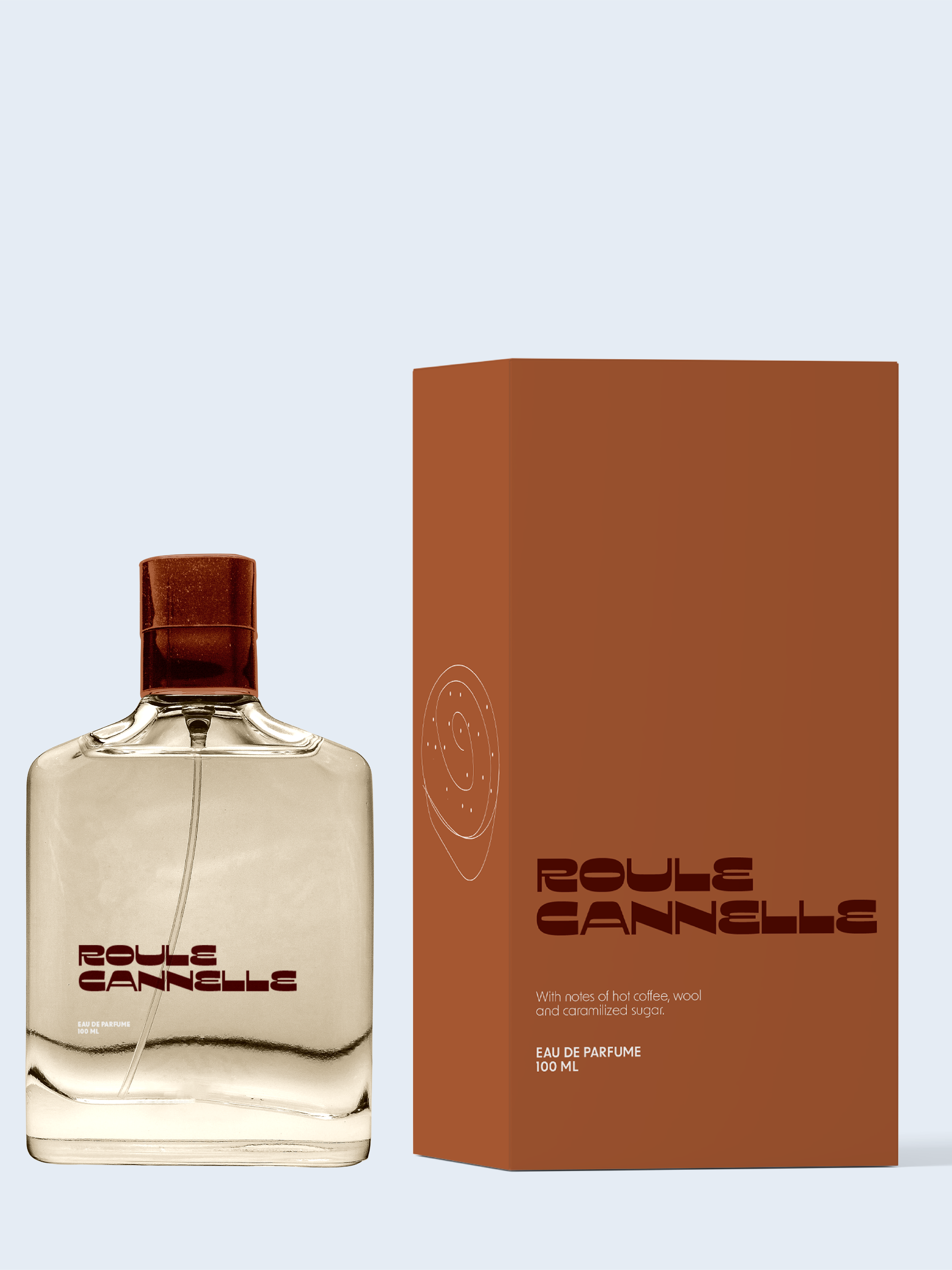 Parfymflaska och förpackning för Rouge Cannelle med beskrivning av doften.