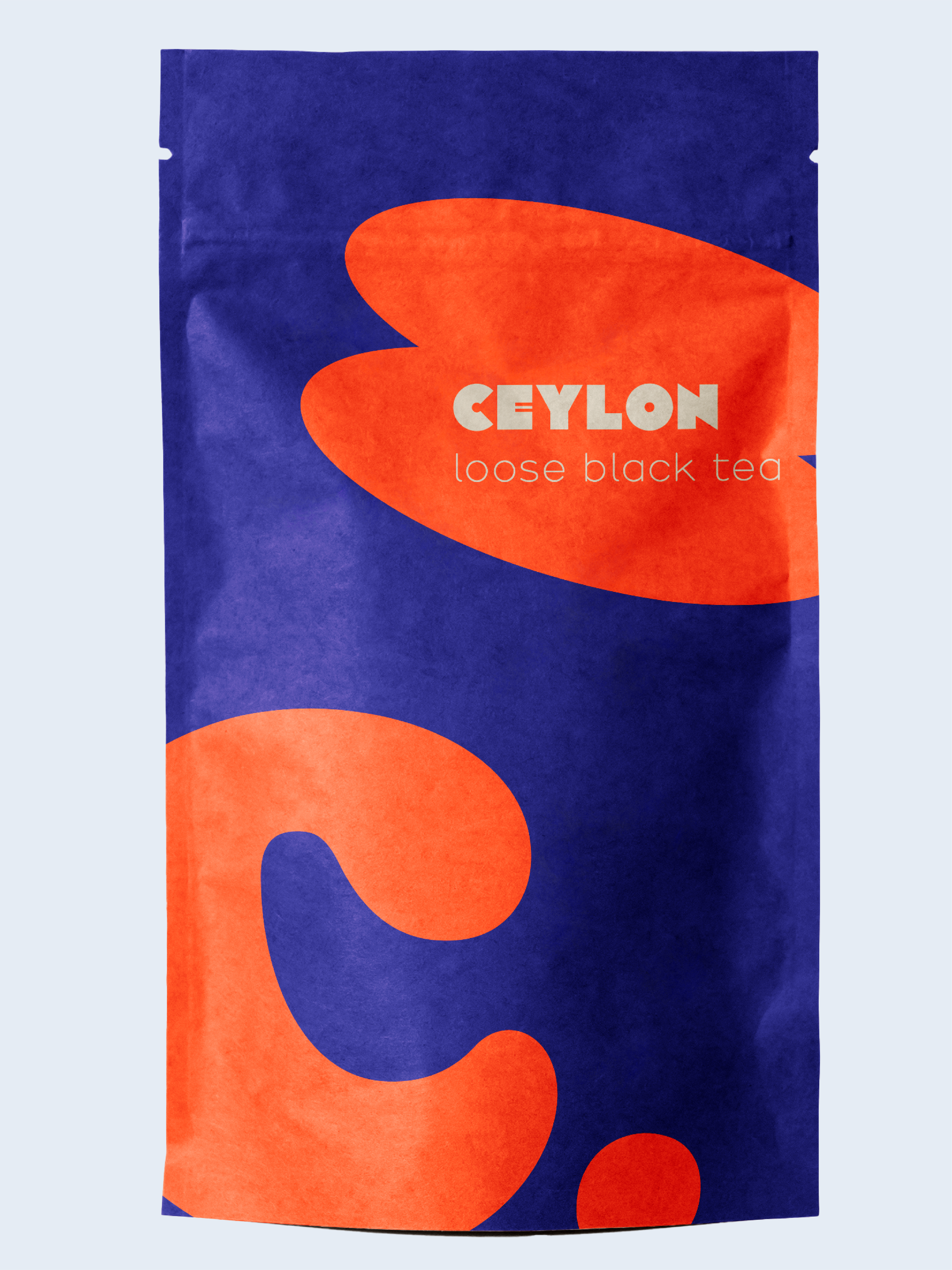 Förpackning av Ceylon löst svart te med blå och orange design.