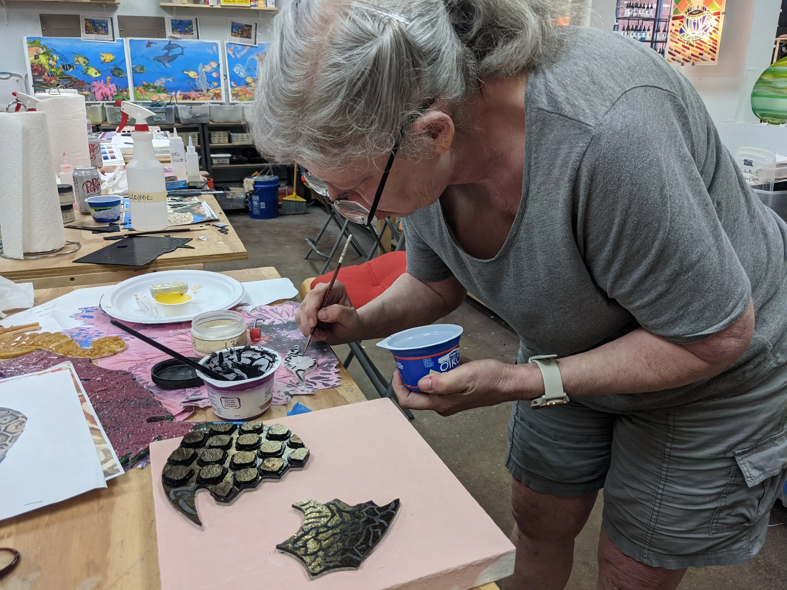 Laurie Rich practicing her powder slurry application technique.