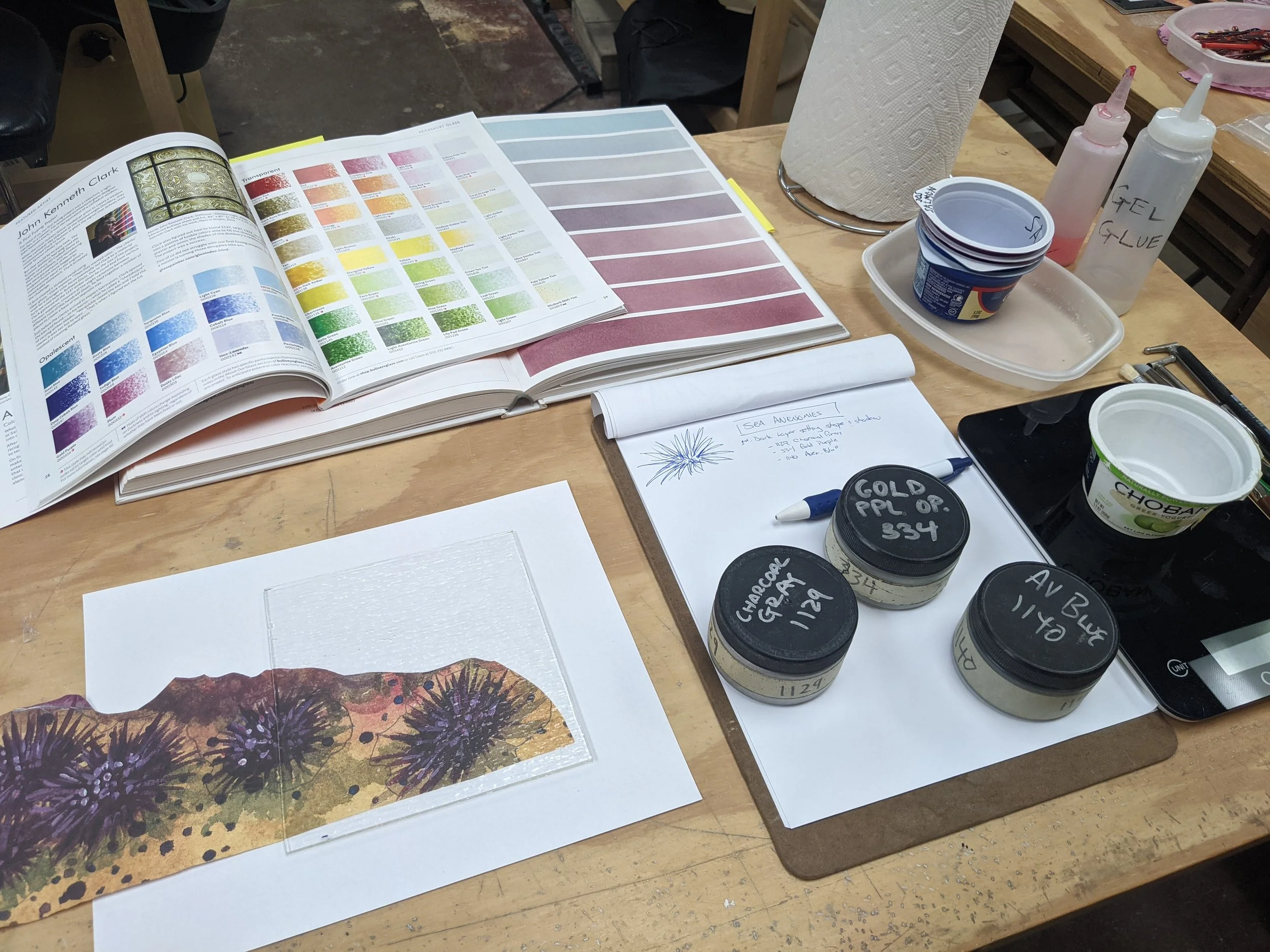 Kristine is selecting colors for the spiny anemones.