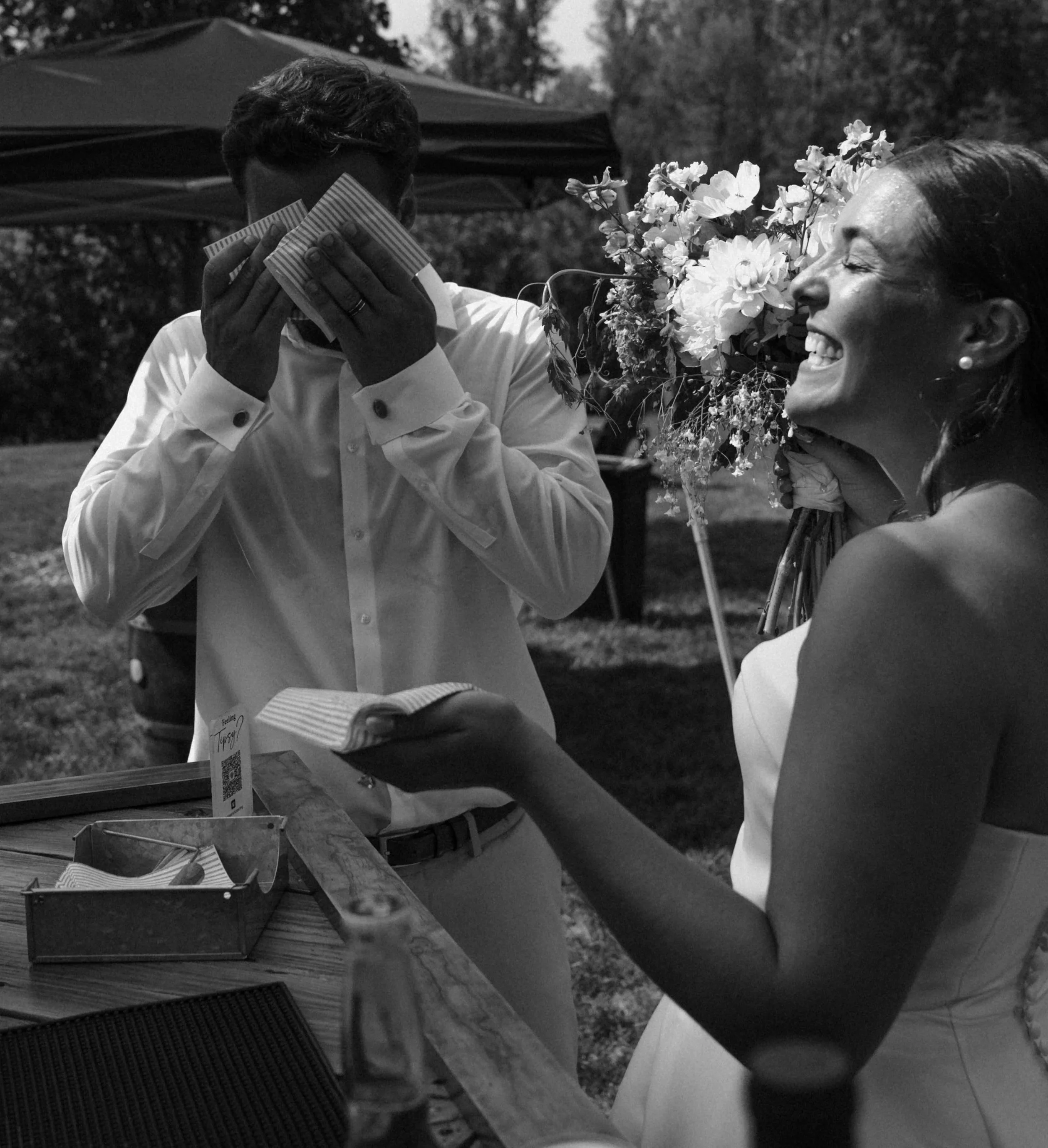 Bride and Groom cleaning up their sweat at Eastwood Farm and Winery summer wedding