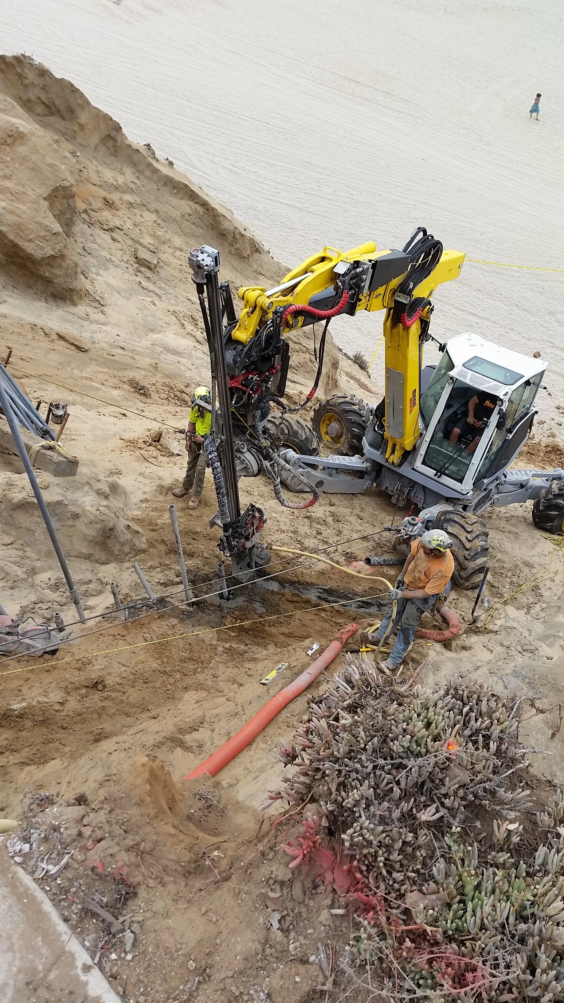 Drill Rig on a coastal bluff installing micropiles during upper-bluff stabilization