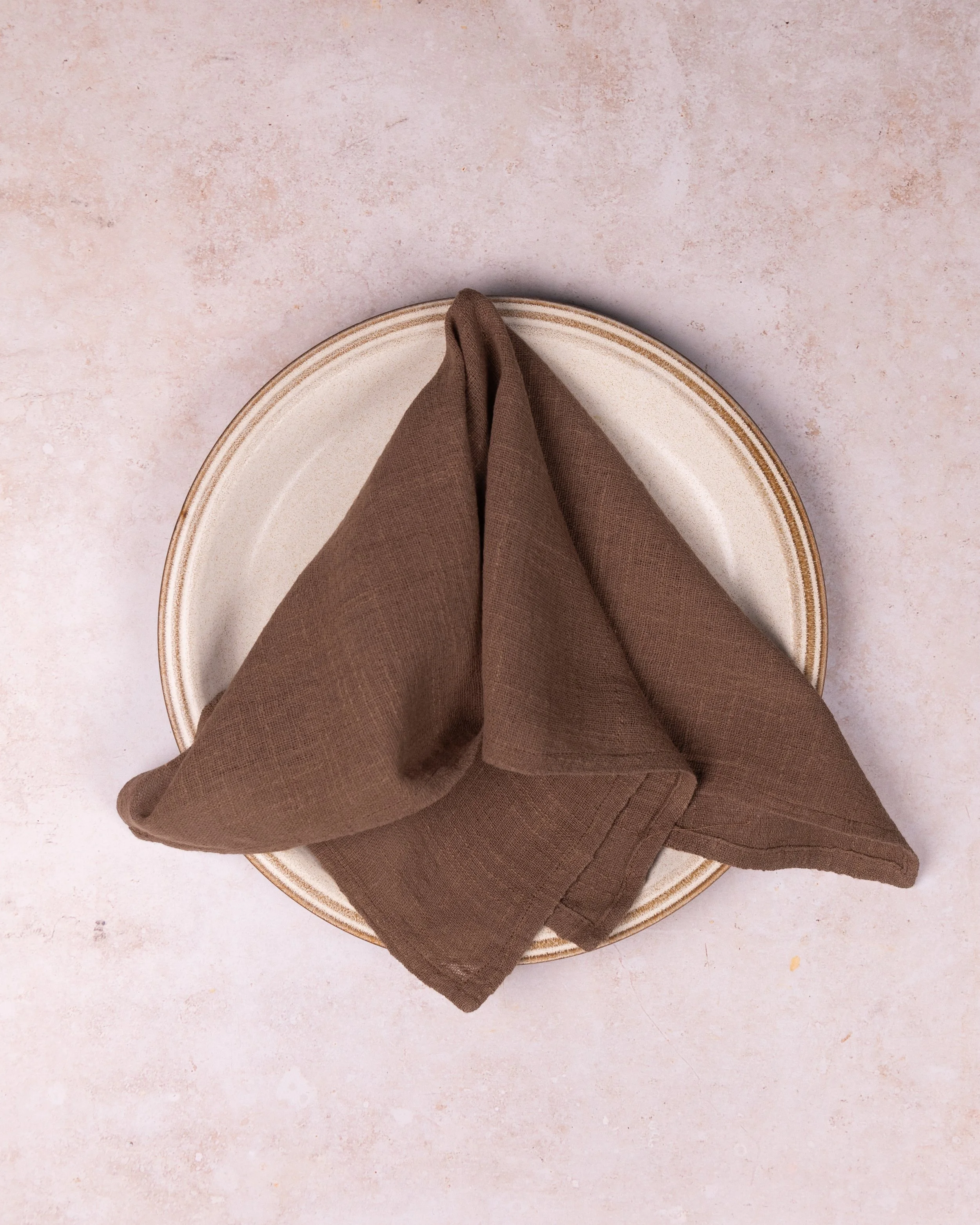 Chocolate brown linen napkin hire styled for a UK wedding
