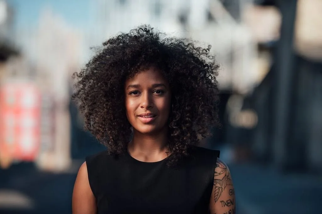 JaKenna Gilbert_Coach_Yoga Teacher_Digital Director_Copenhagen Denmark_Smiling_2.jpeg