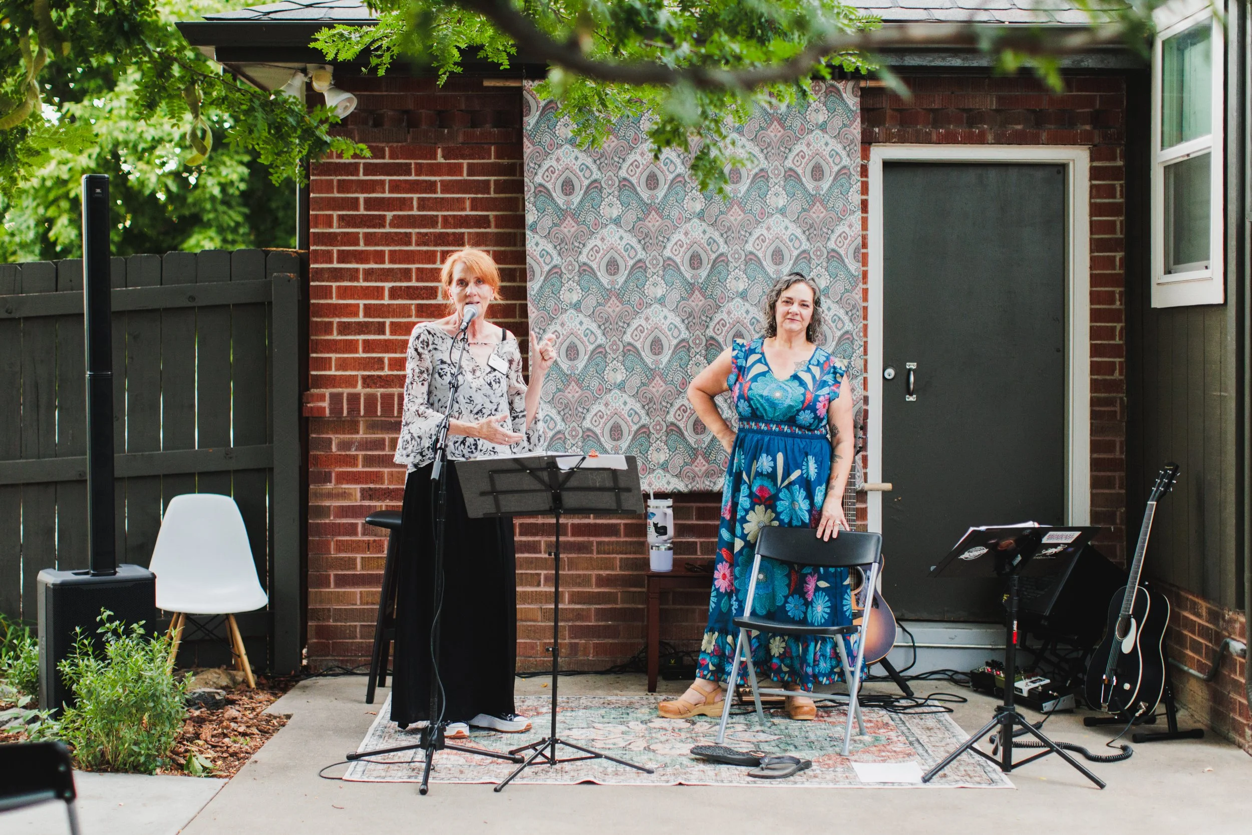 Early Childhood Service Corps Executive Director Lisa Armao speaks at a relaxed event in a Colorado backyard