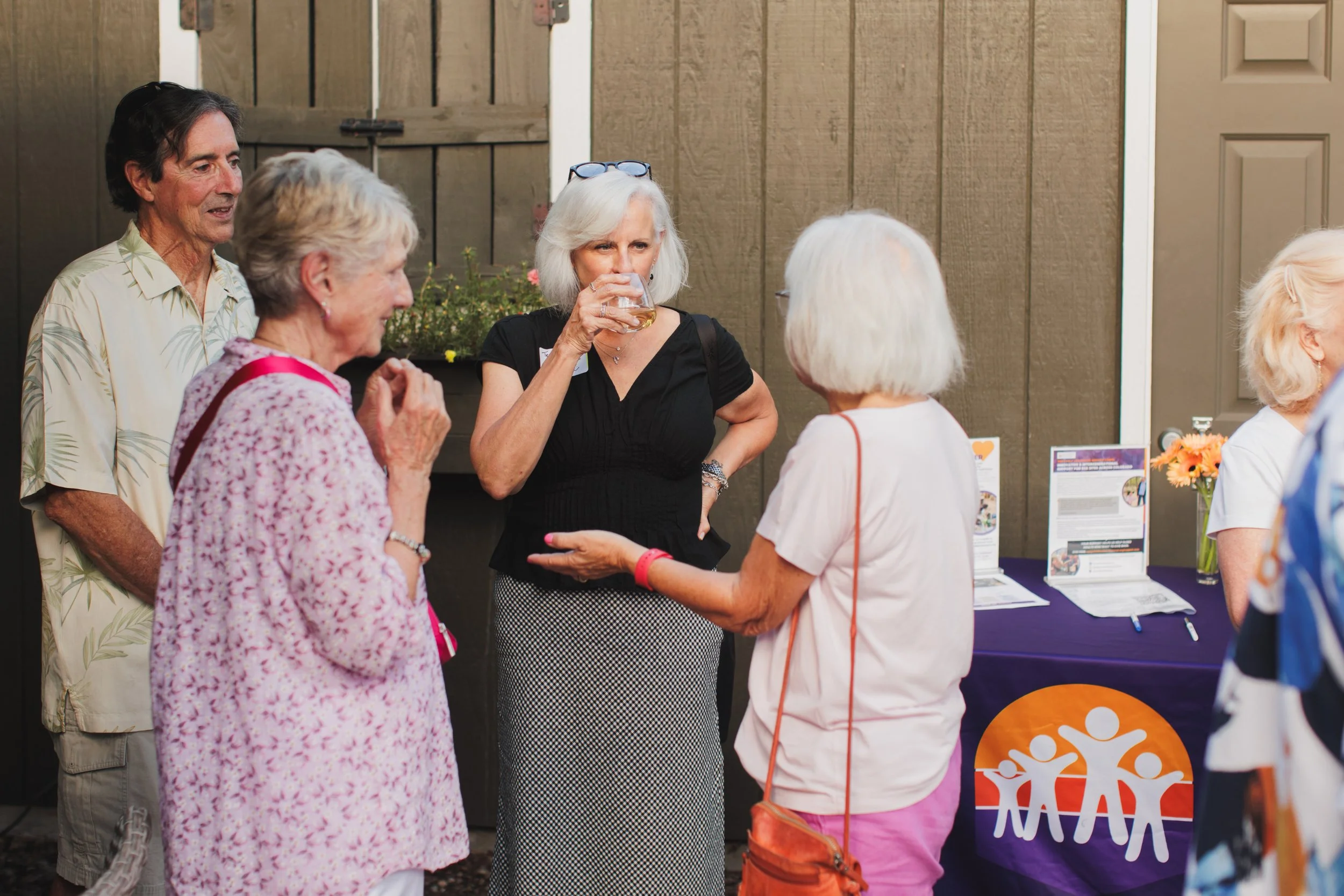 colorado retirees in early childhood mingle at a party