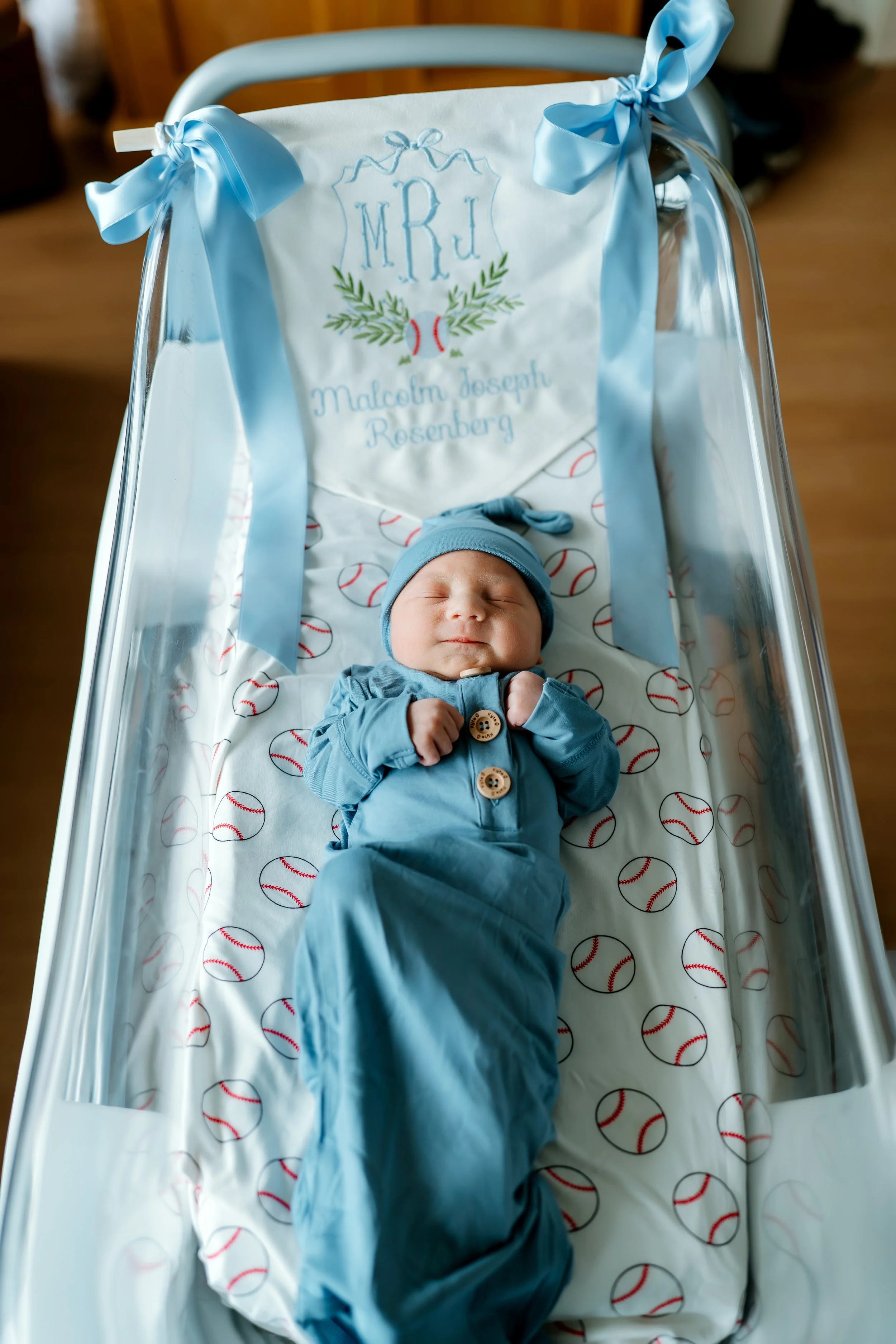 Newborn baby resting in the hospital during a Fresh 48 photography session in The Woodlands, TX