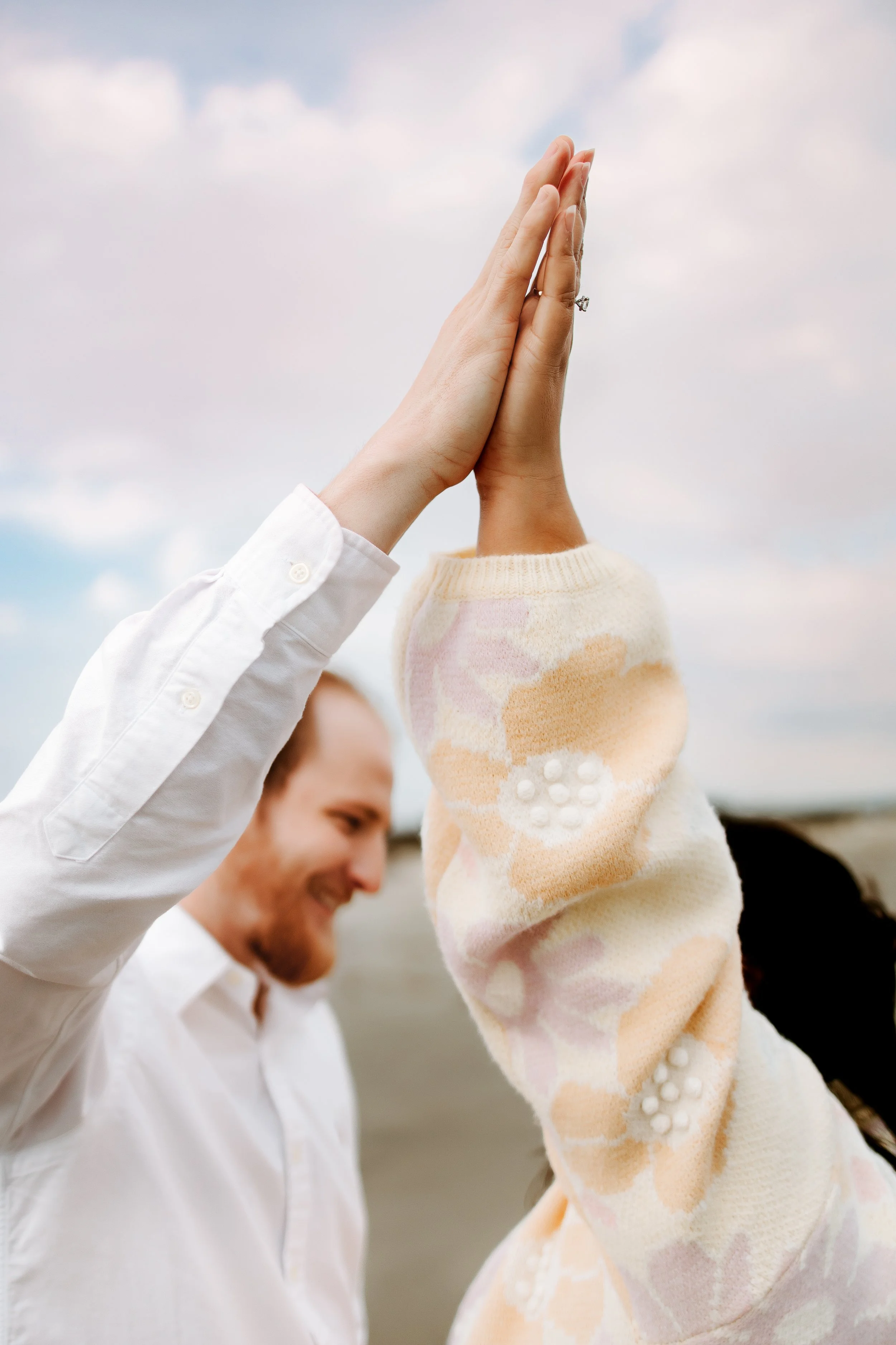 Couple sharing a joyful moment during a family photography session