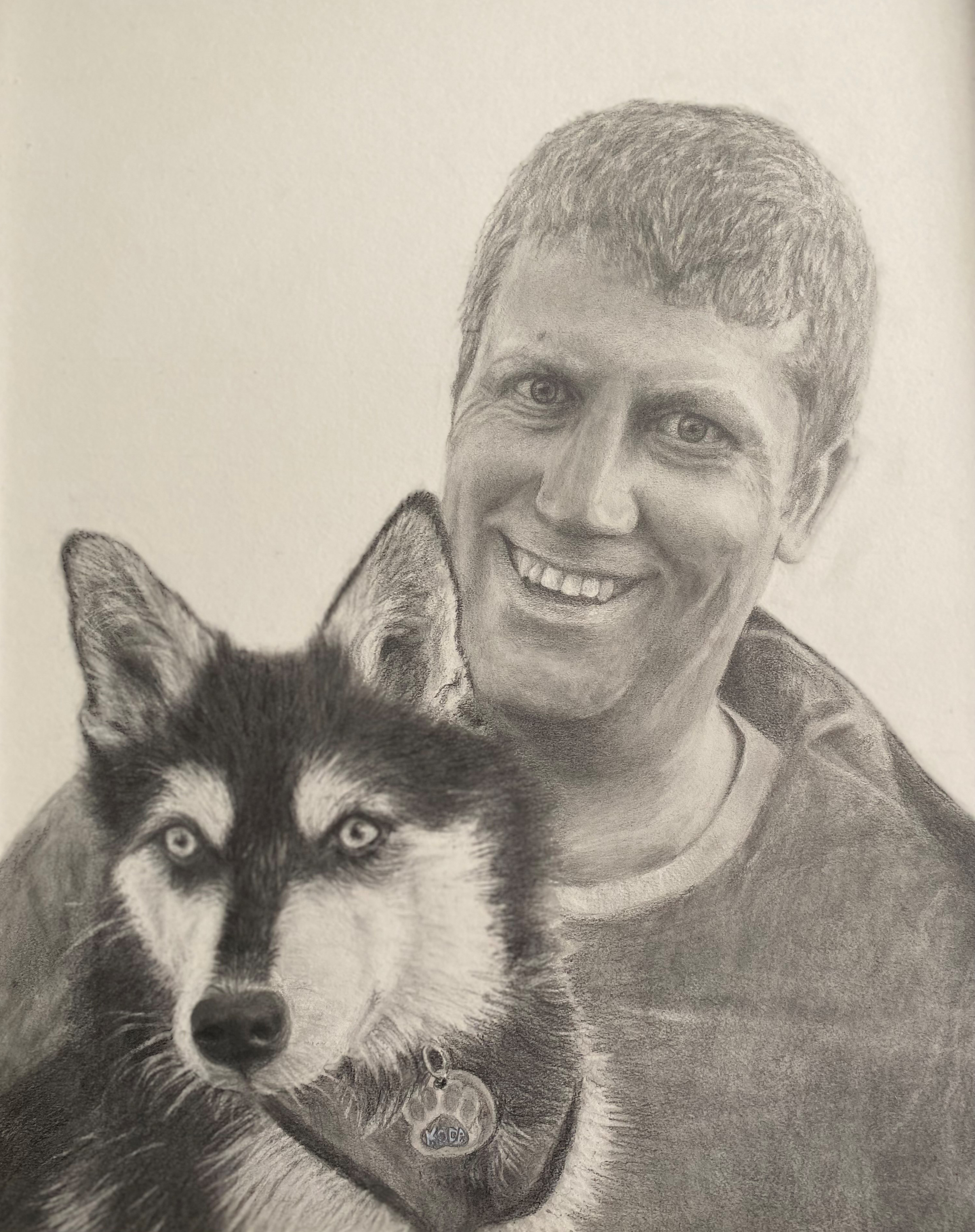 Custom graphite portrait commission featuring a man and his dog by artist Joyce Casey
