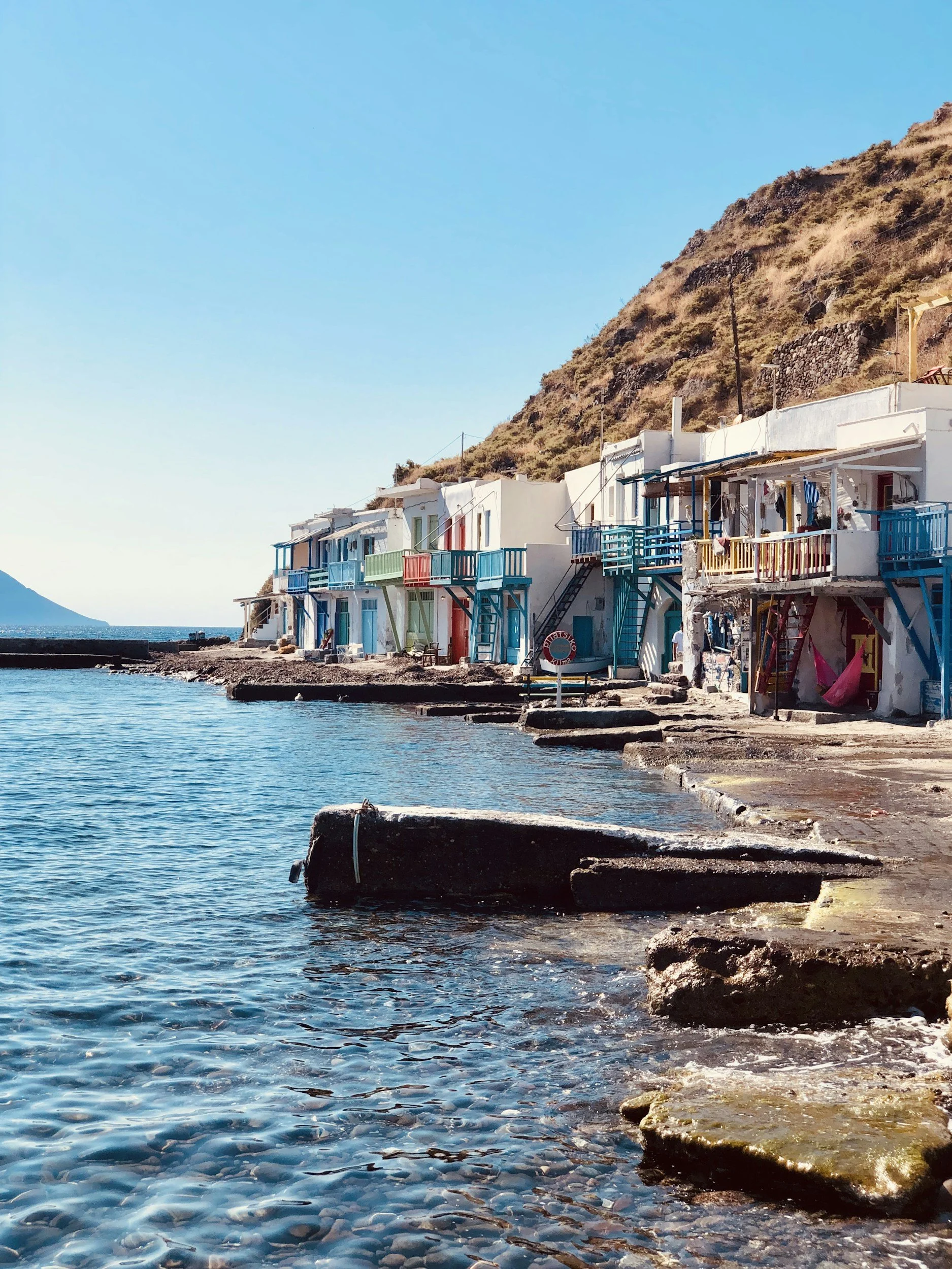 Small fishing boats in the harbor at Milos, Greece