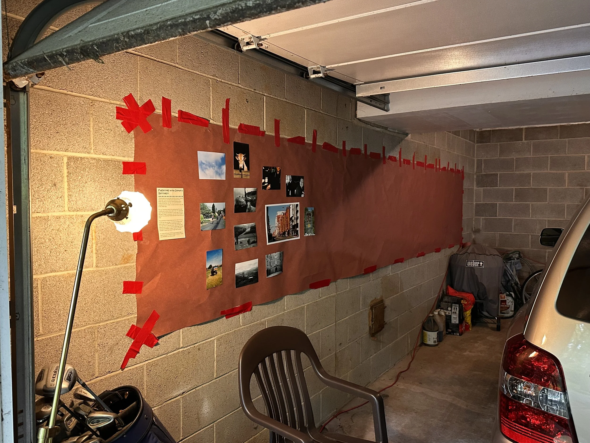 Setting up the photo wall, which proceeded to fall about three times