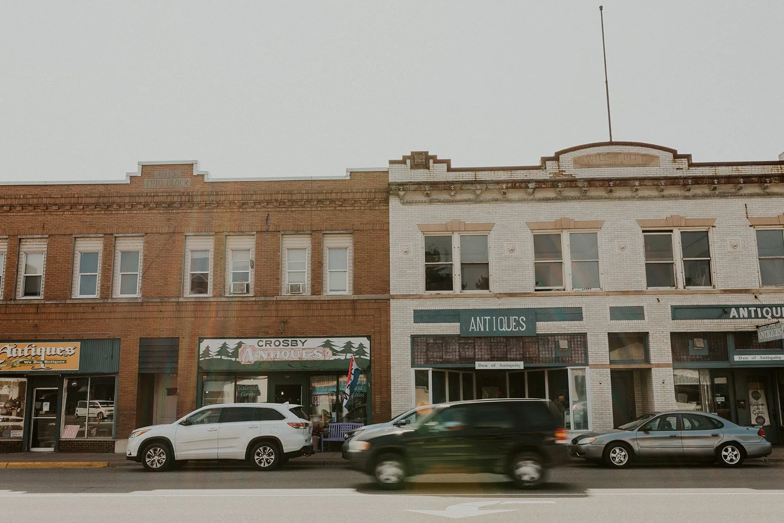 Historic main street crosby with a view of a few antique stores, Shop Victual nearby. 