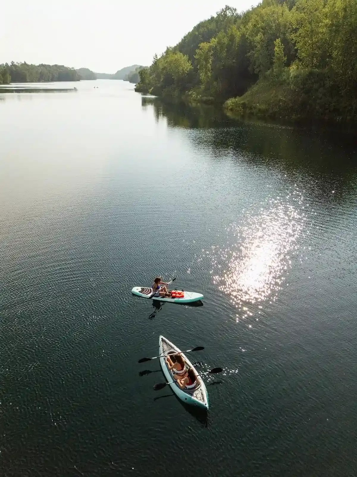 Kayaking and paddle boarding on Huntington Mine Lake in Cuyuna Country State Recreation Area near Crosby Minnesota