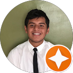 Google review of Lemelana MedSpa. Portrait of a young man with dark hair and a friendly smile, wearing a white shirt and black tie, standing against a green background.