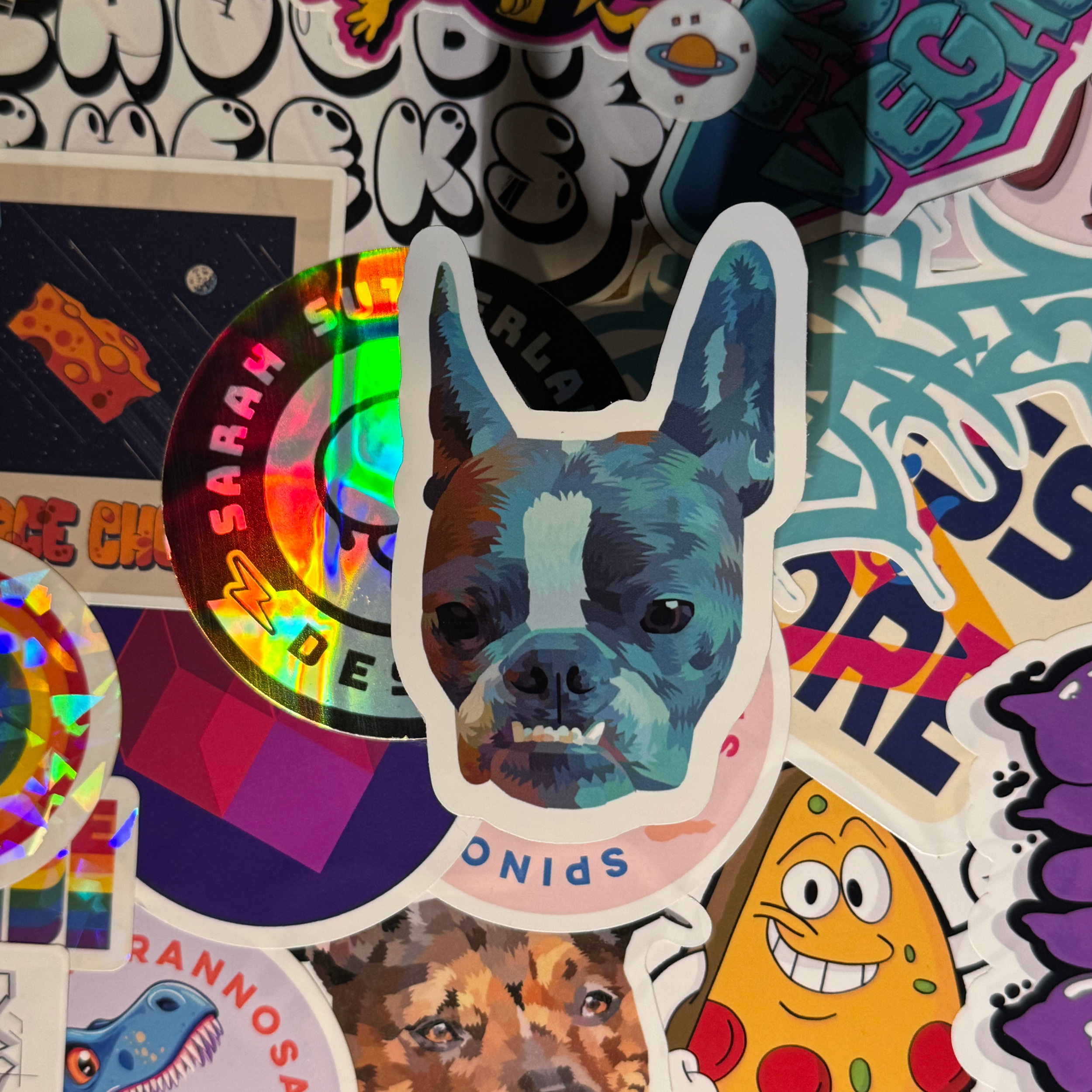 photo of hand-made sticker to show quality of a picture of a frenchton or a boston terrier mixed with a french bulldog or frenchie custom made in adobe illustrator using vector shapes