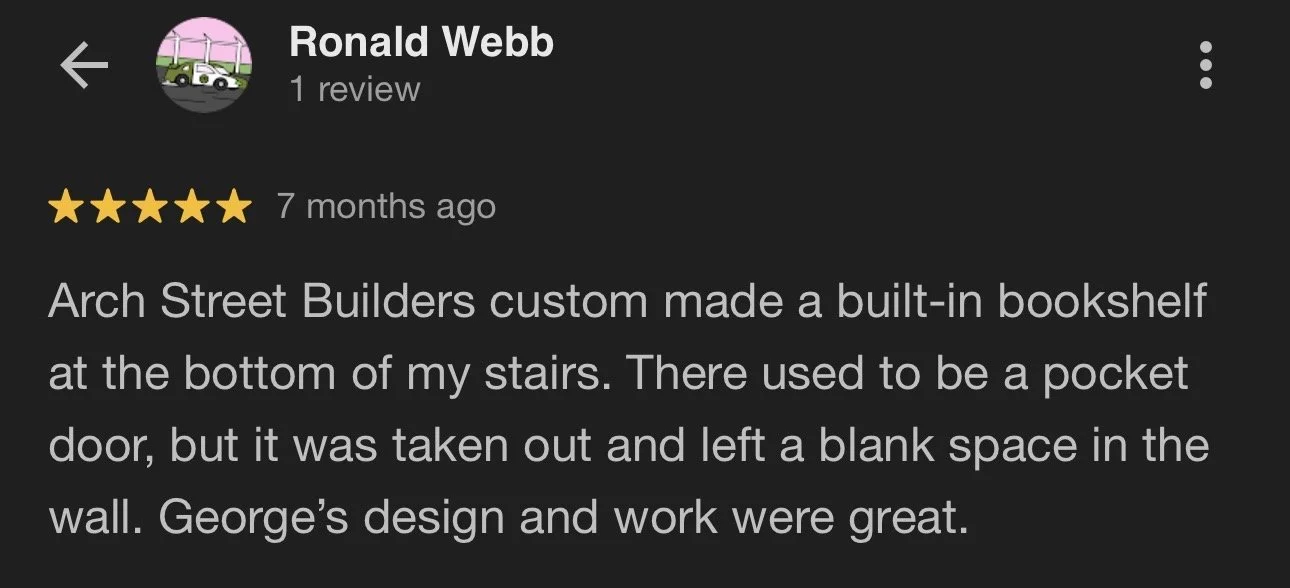 Screenshot of a Google review for Arch Street Builders, describing a custom built-in bookshelf at the bottom of stairs