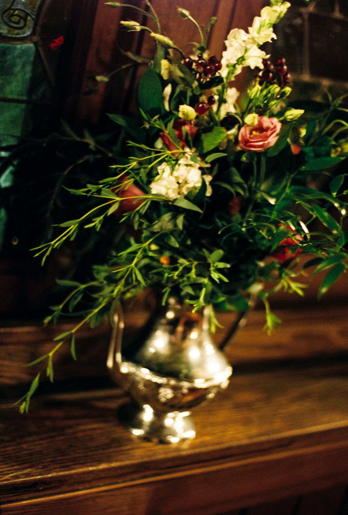 greenery in beautiful silver vase