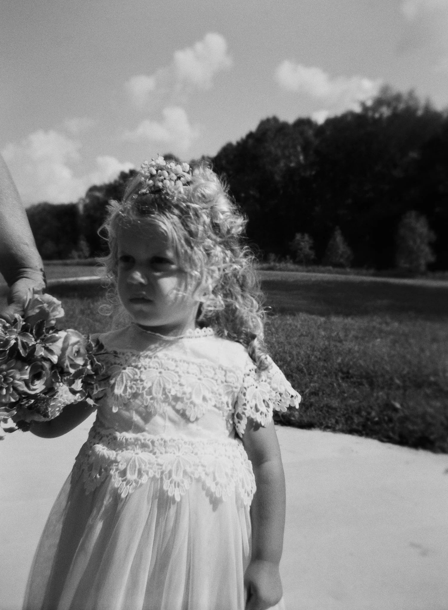 flower girl outdoors black and white