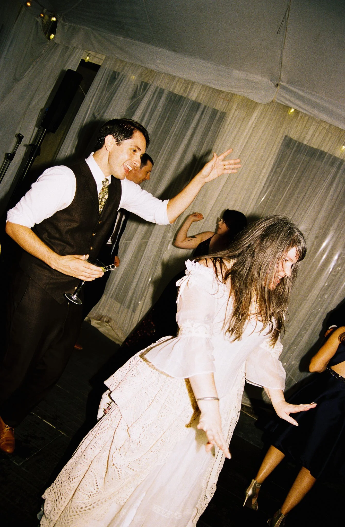 bride and groom dancing