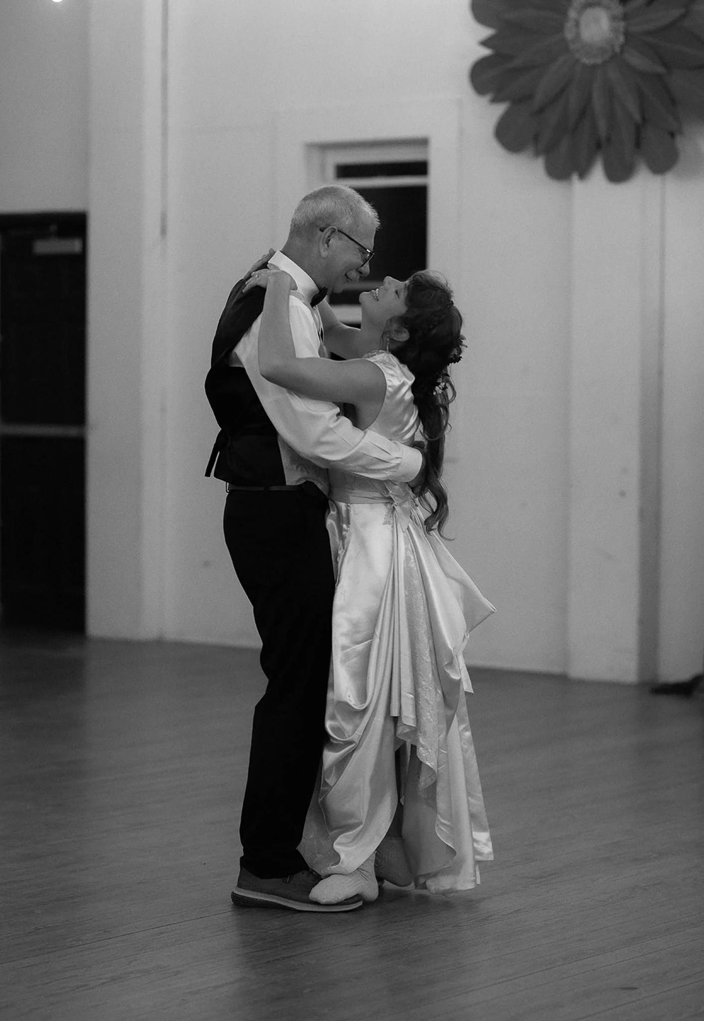 black and white portrait dancing at wedding