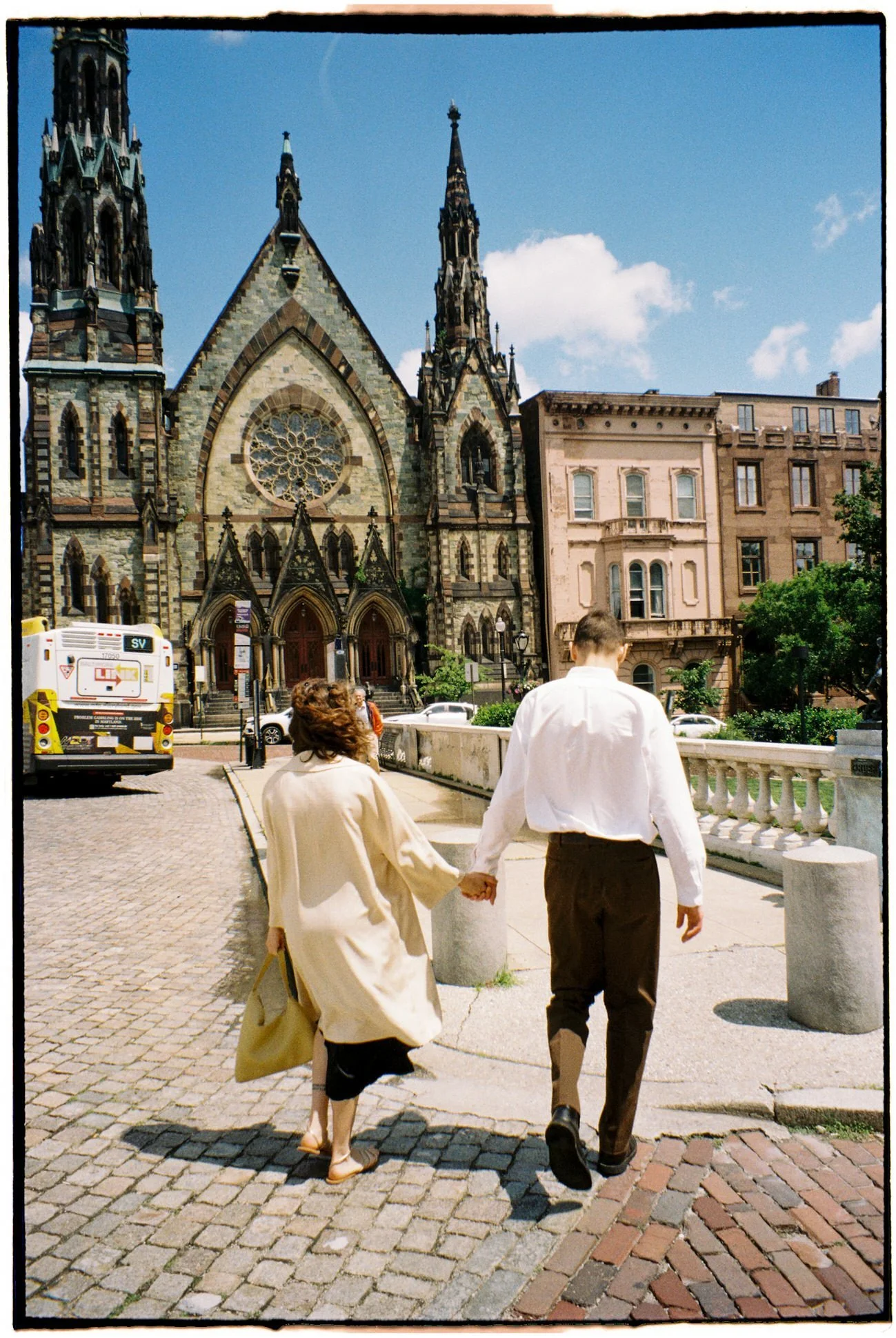 couple walking through Mt Vernon Square 