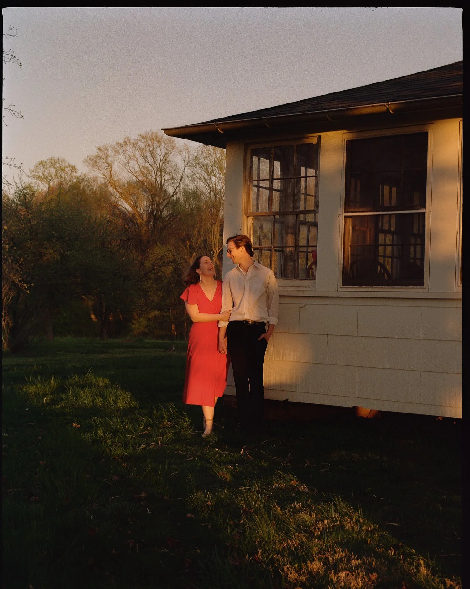 candid artful photography with couple outside house