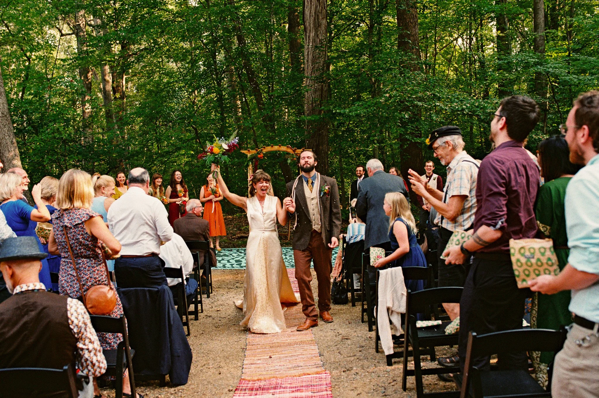 couple walking down the aisle photo