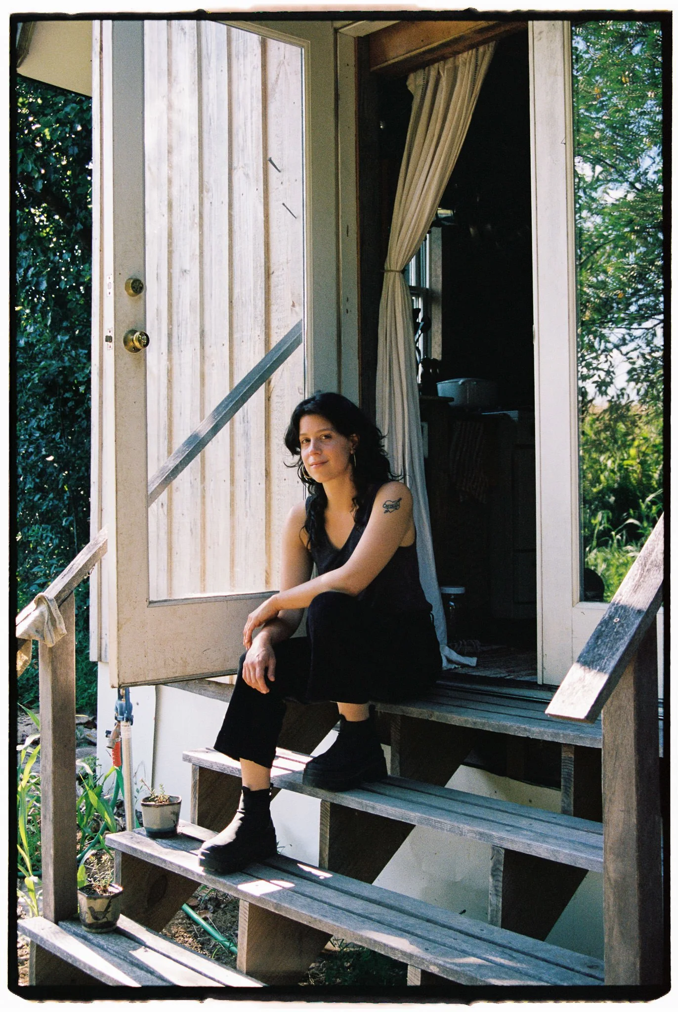 casual portrait sitting on steps