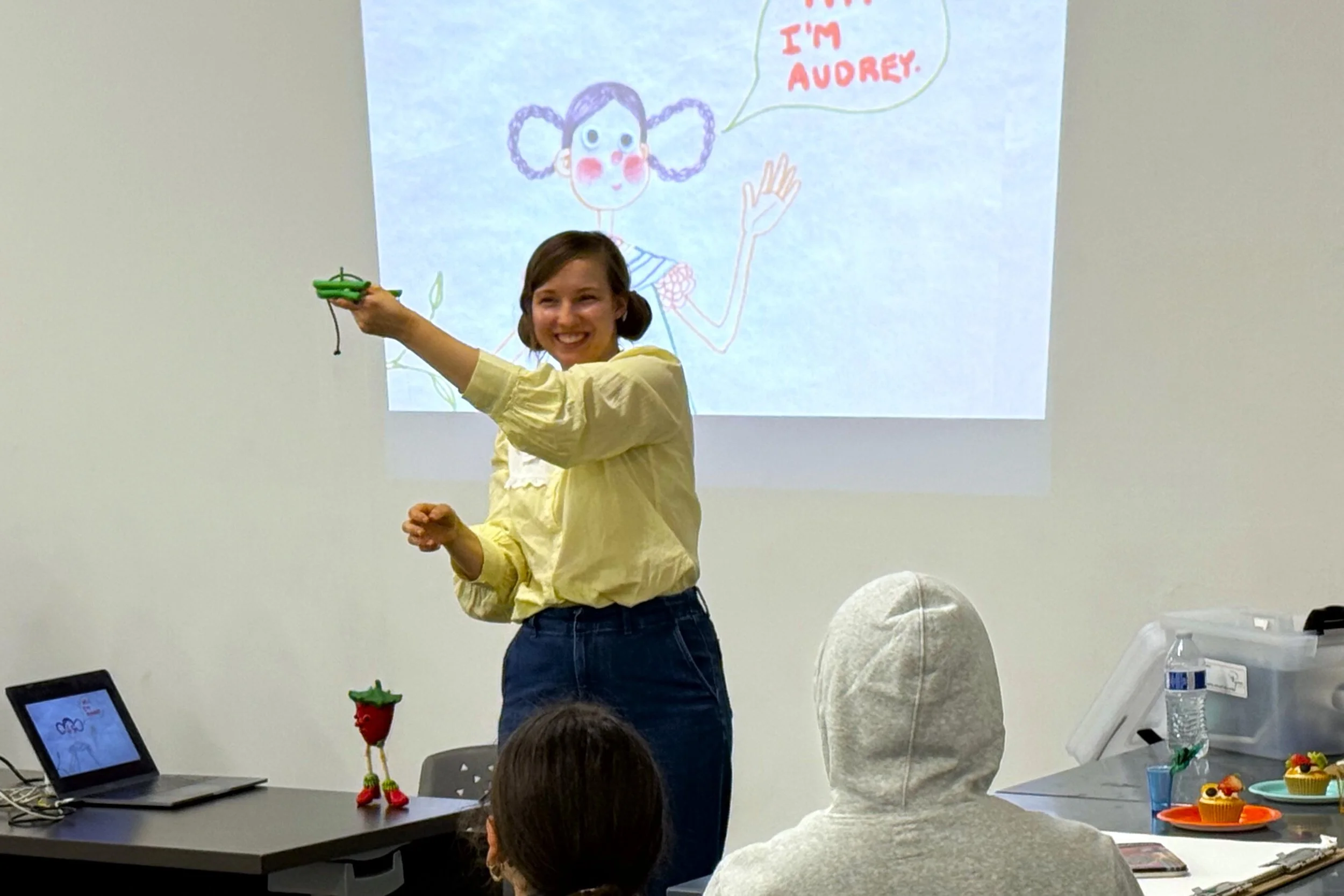 Guest artist Audrey Densmore (Ryman ‘11) demonstrating puppeteering at USC