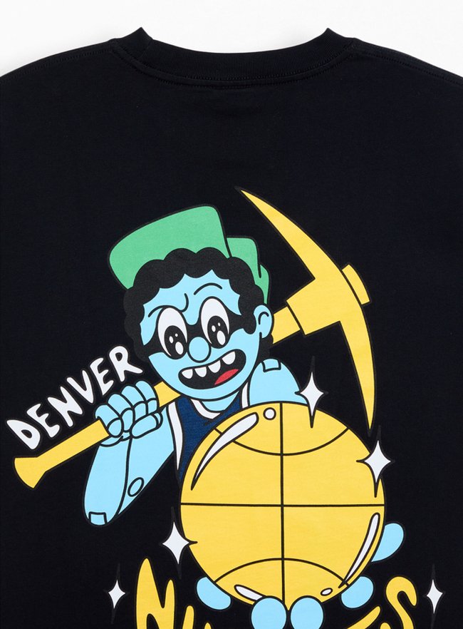 Cartoon character with glasses, green hat, holding a yellow pickaxe labeled 'Denver,' sitting on a large gold nugget with sparkles and stars around it, on a black background.
