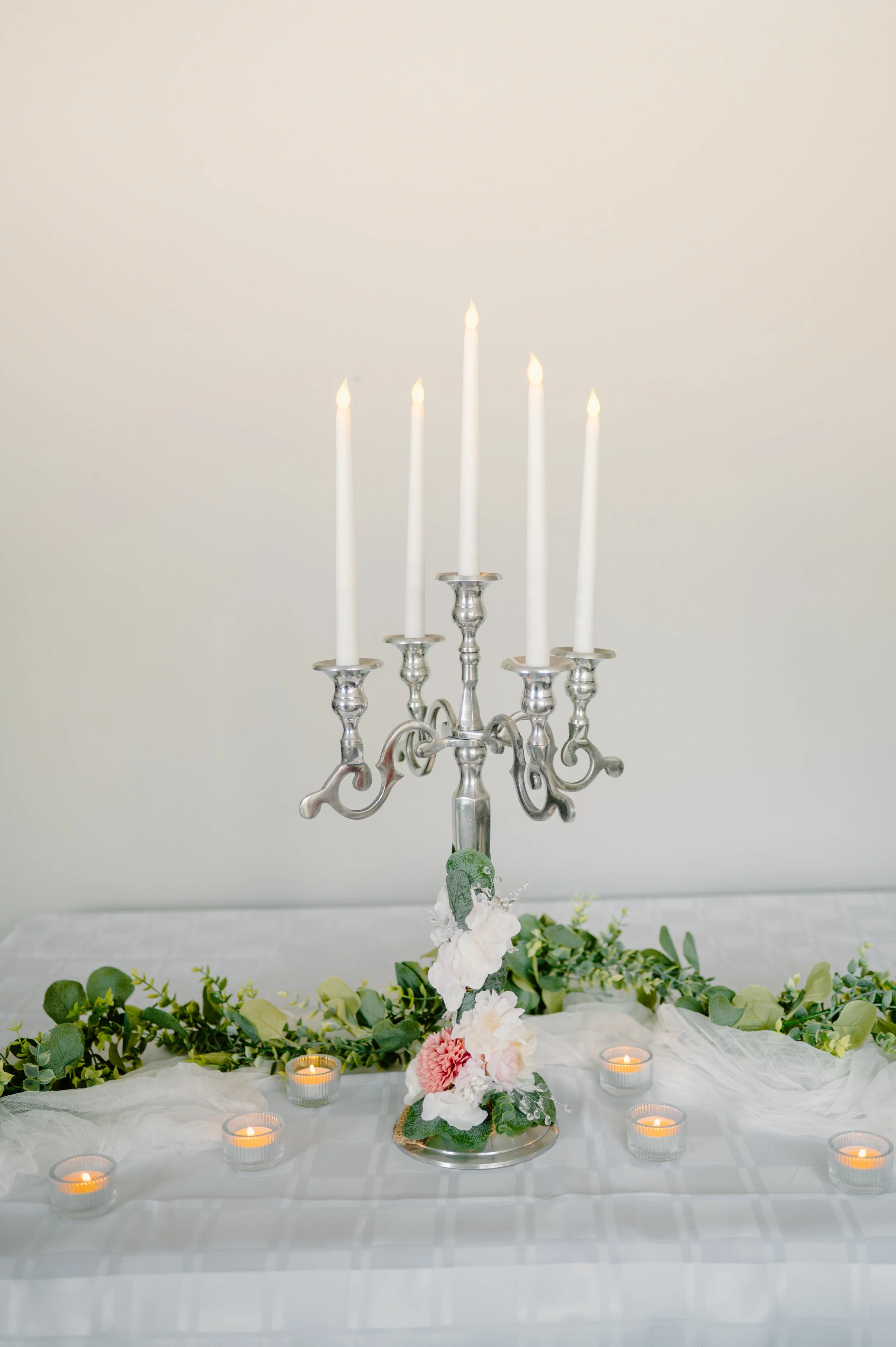 Large silver candelabra, 5 candles. 
29" H with candles.  1-day rent $40.