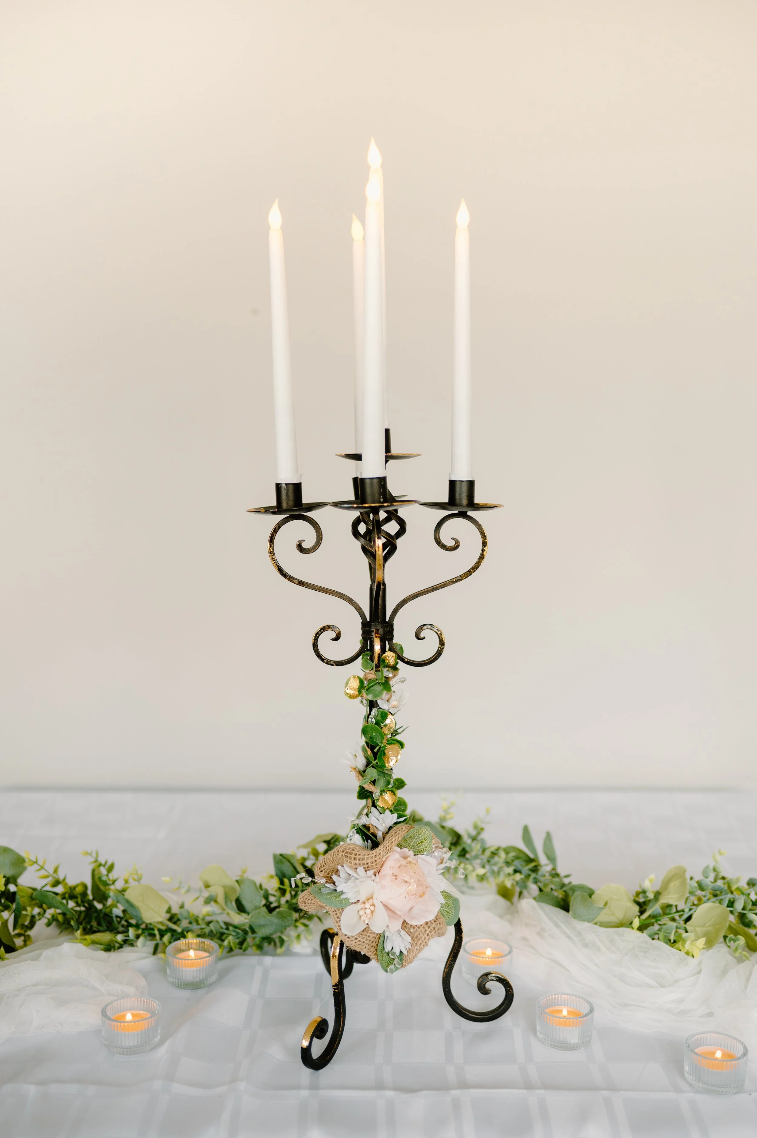 Large black and gold candelabra, 5 candles.
32" H with candles.  1-day rent is $40. 
