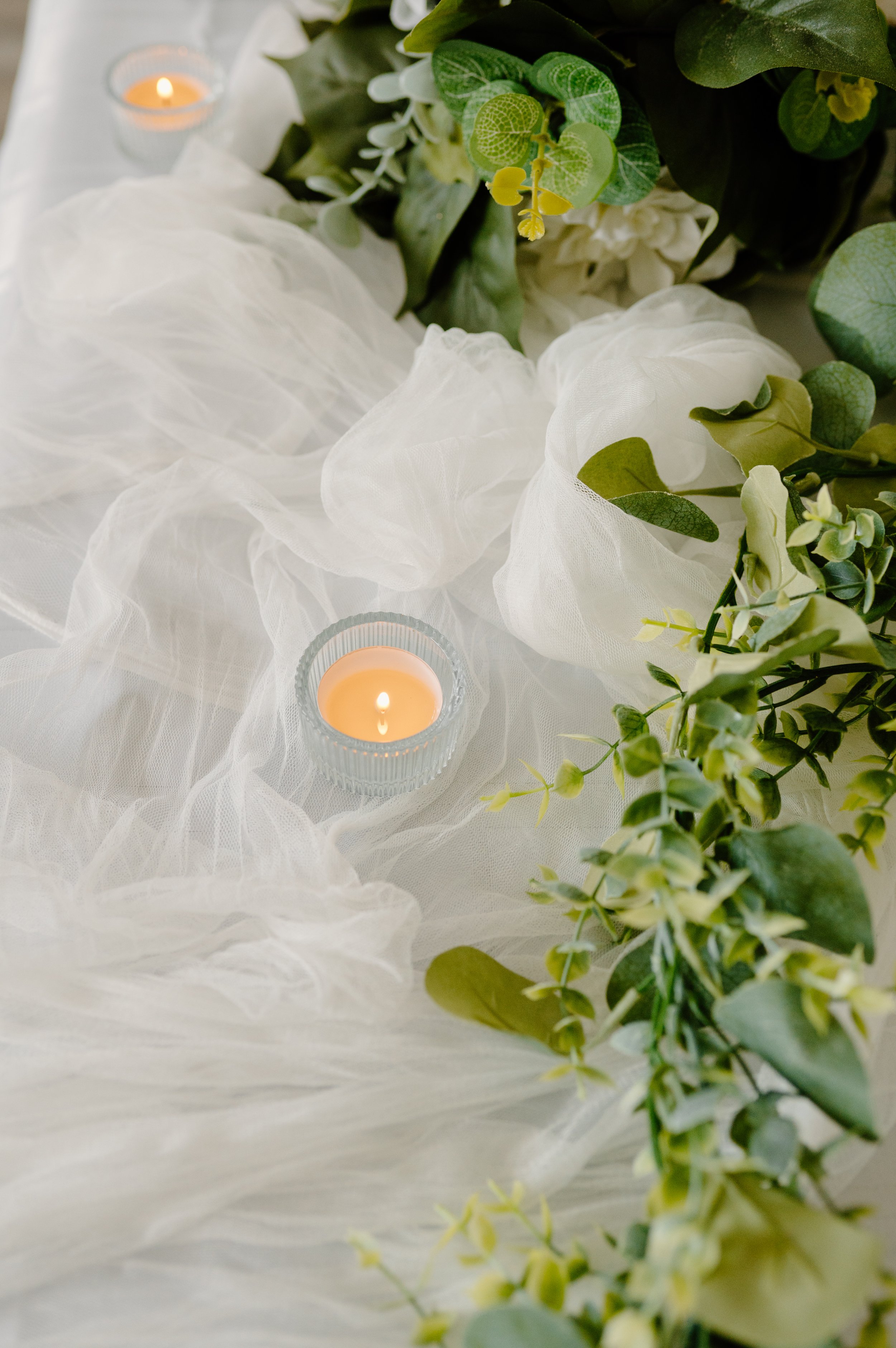 White gauze table runner
5" L.  1-day rental $5.