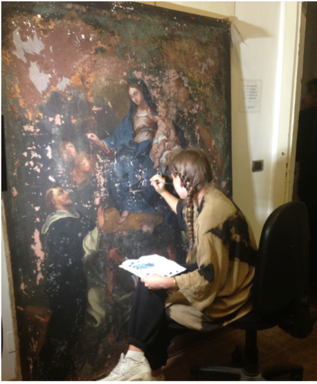 Large format canvas painting during in-painting procedure Toronto