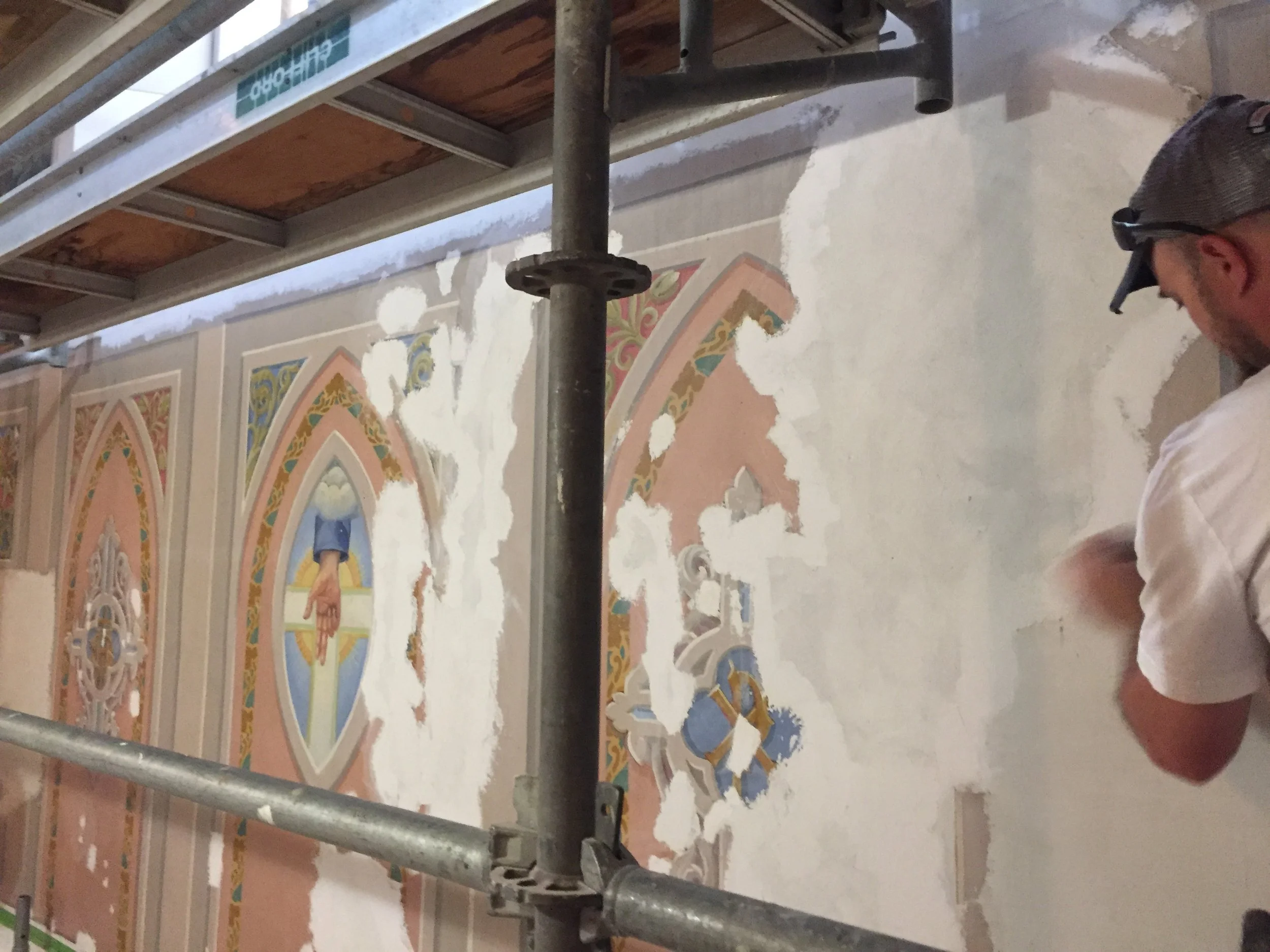 Church Restoration during restoration of wall paintings, filling losses and preparing retouching in Toronto Ontario