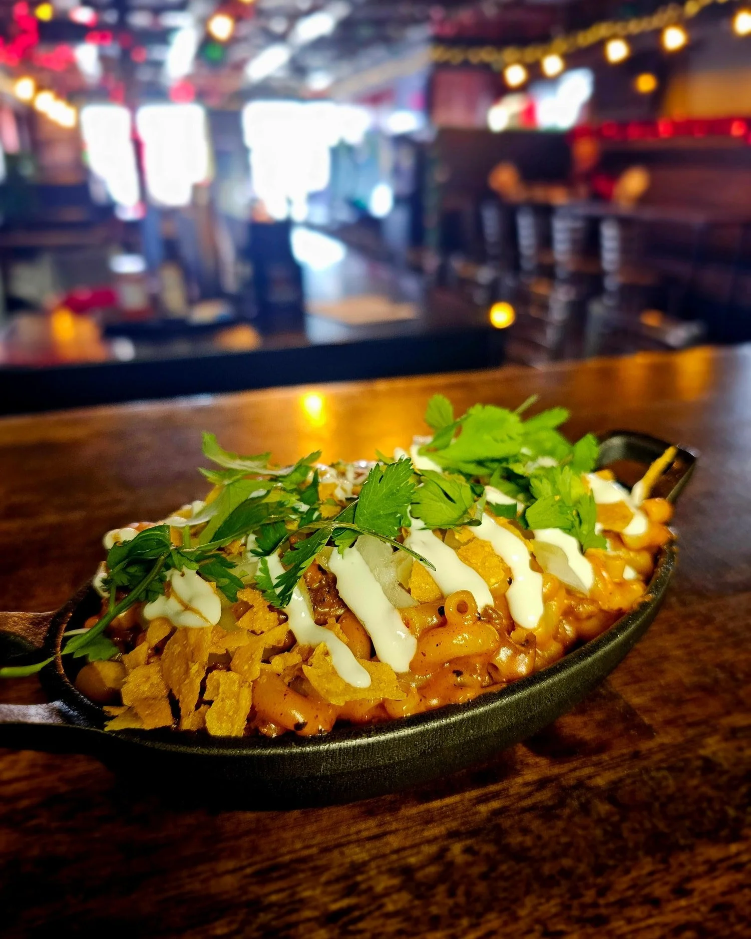 🌮 TACO MAC

Our house beer cheese mac, with seasoned ground beef, diced onions, tortilla chips, crema, and cilantro. 

#MondaysOnly #Special #MacMonday