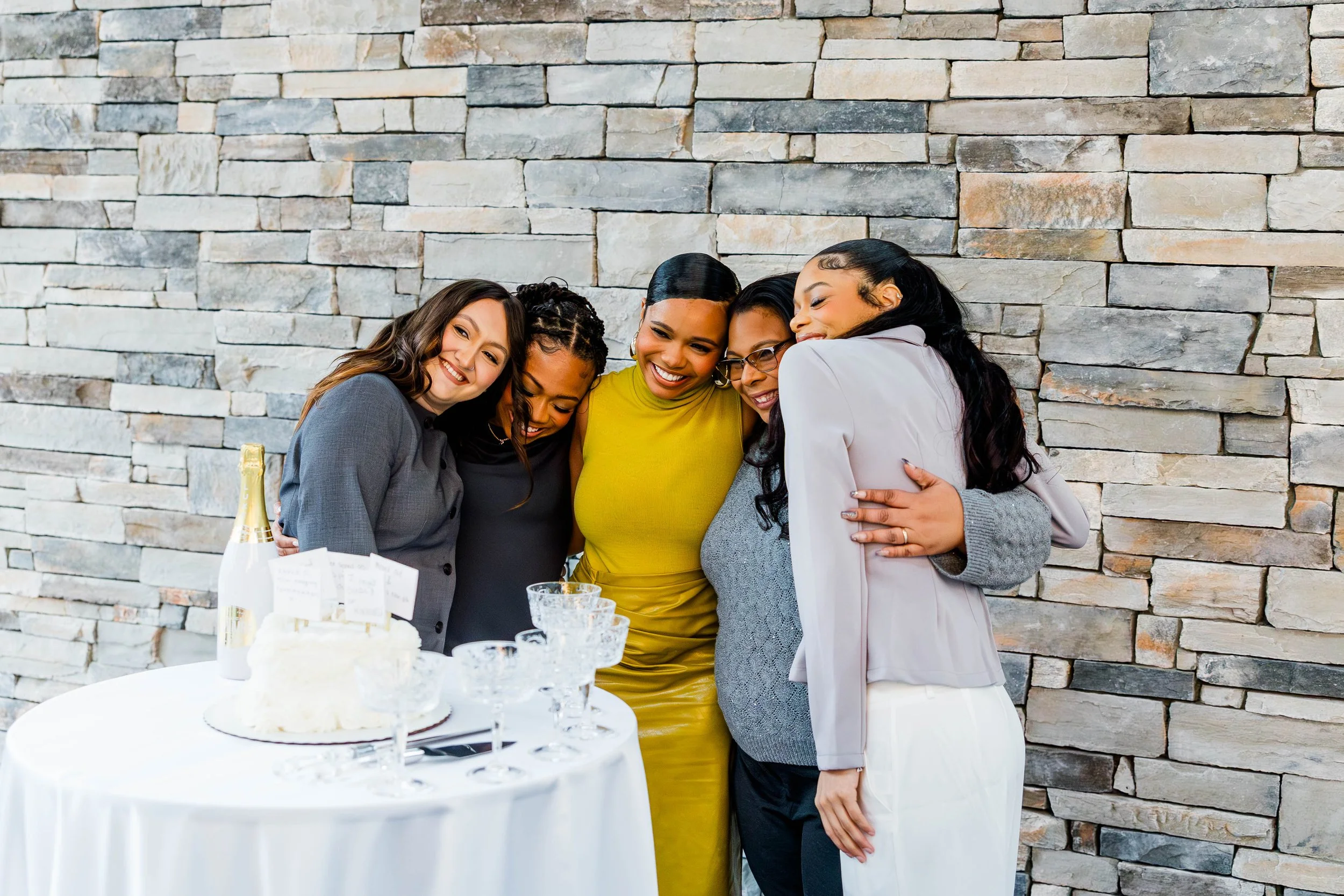 team of Richmond VA event planners hugging