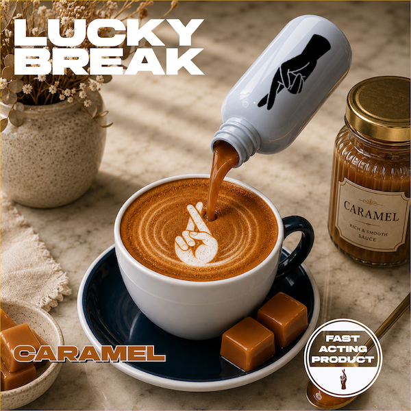 A white mug with a hand and fingers making a peace sign, filled with coffee or hot chocolate with latte art of a hand making a peace sign. A bottle with a silhouette of a finger pointing down is pouring into the mug. There are caramel candies on the saucer, a jar labeled 'Caramel' on the right, and a potted plant on the left. The image has text saying 'Lucky Break' and 'Caramel'.