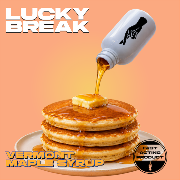 Stack of four pancakes with butter and maple syrup on a white plate, with syrup being poured from a bottle labeled for adult use. Text overlay reads "Lucky Break," and at the bottom, it says "Vermont Maple Syrup." A black circular badge indicates it is a "Fast Acting Product."