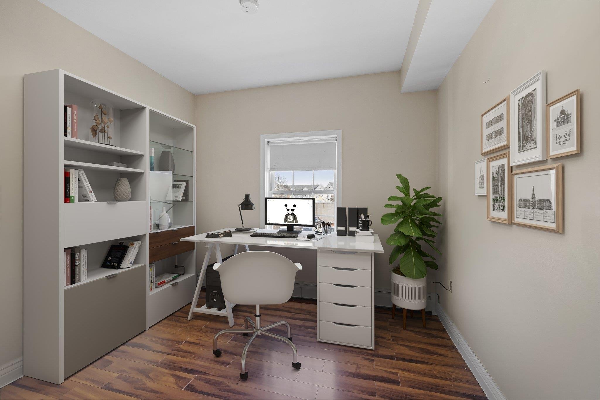 Modern home office with desk, chair, computer, shelves, and wall art. Features hardwood flooring, a potted plant, and neutral wall decor.
