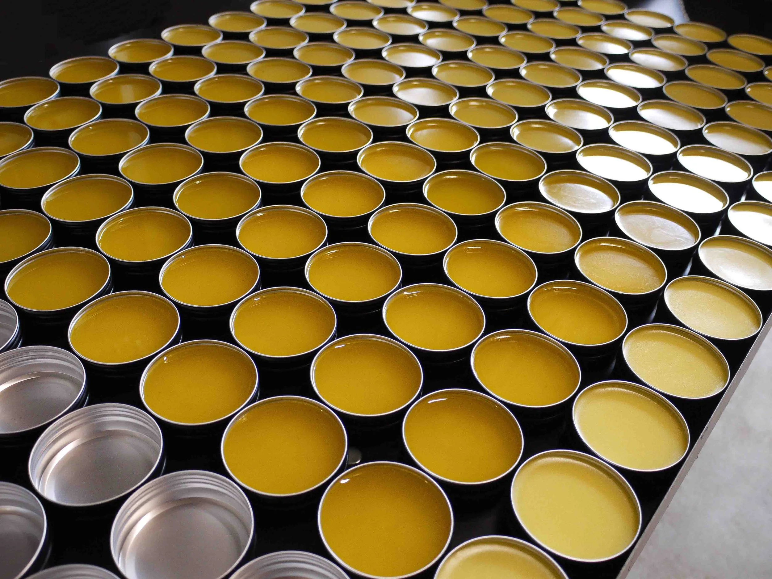 Batch of partially poured skincare balms
