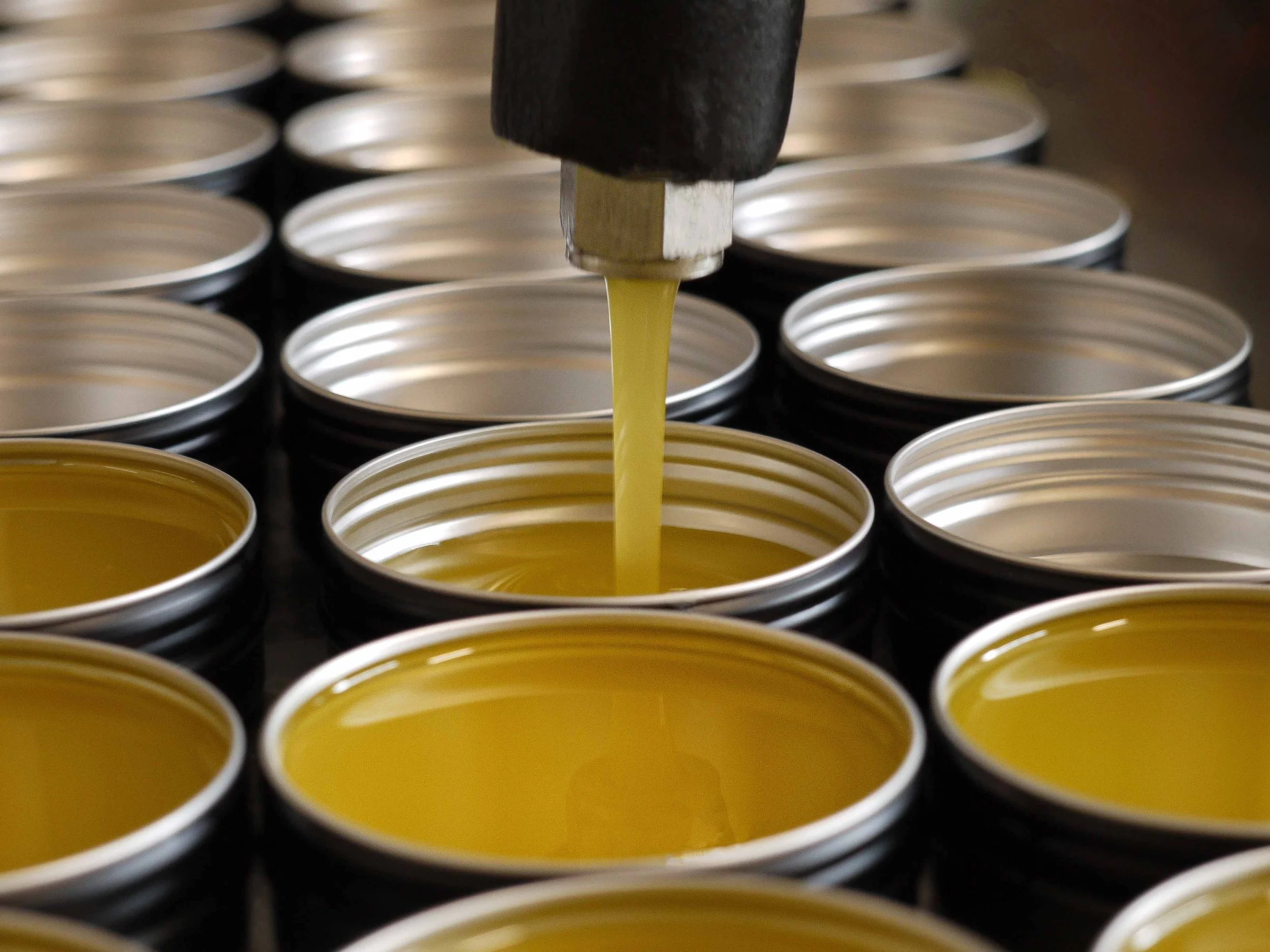 Hand-pouring our luxury skincare balms