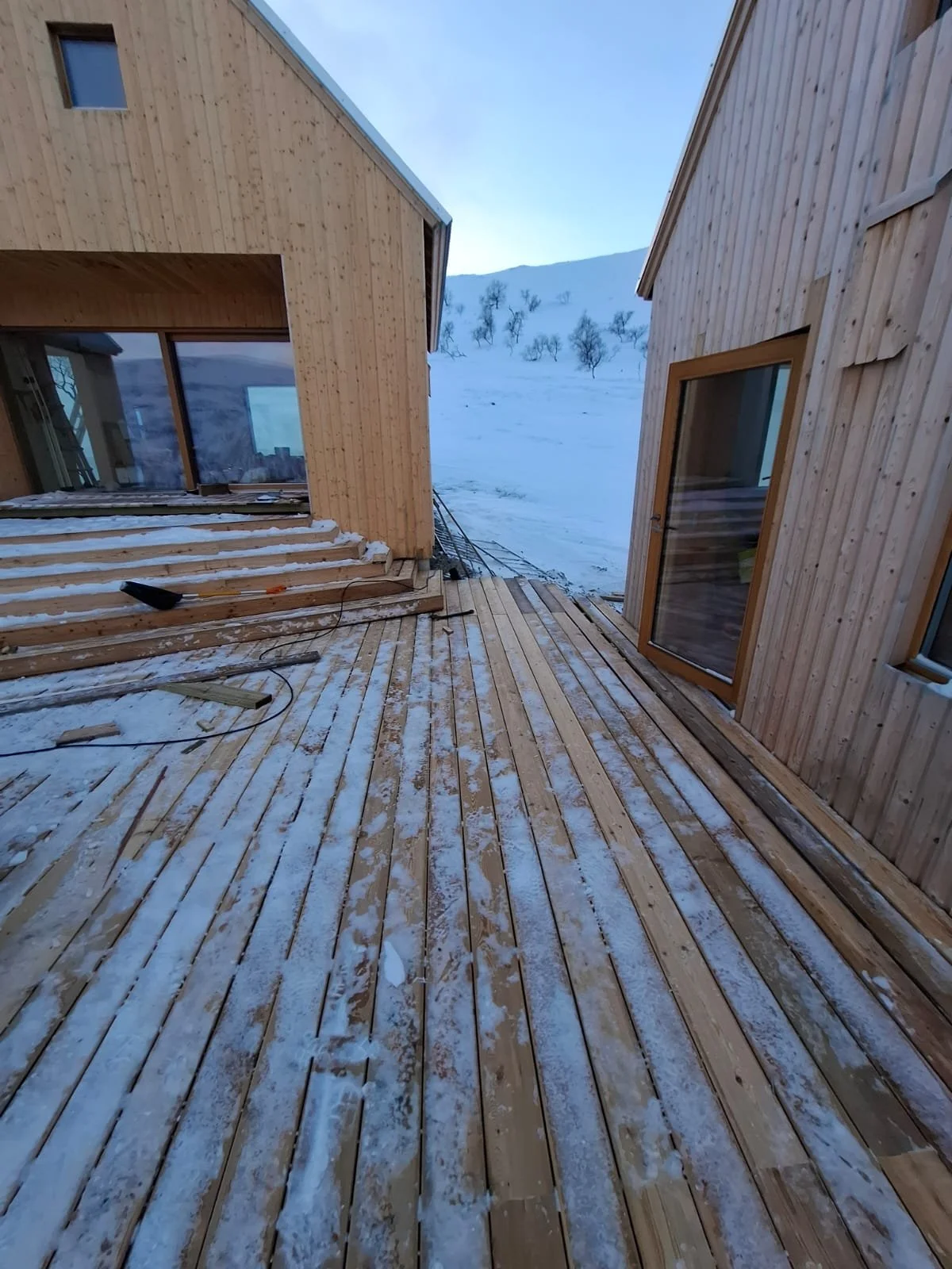 Utsjoki, Finland, Lapland, luxury cabin, rental, remote, arctic, northernmost, Scandinavian design, private villa, aurora borealis, northern lights, wilderness retreat, Nordic architecture, exclusive stay, hidden gem, winter wonderland