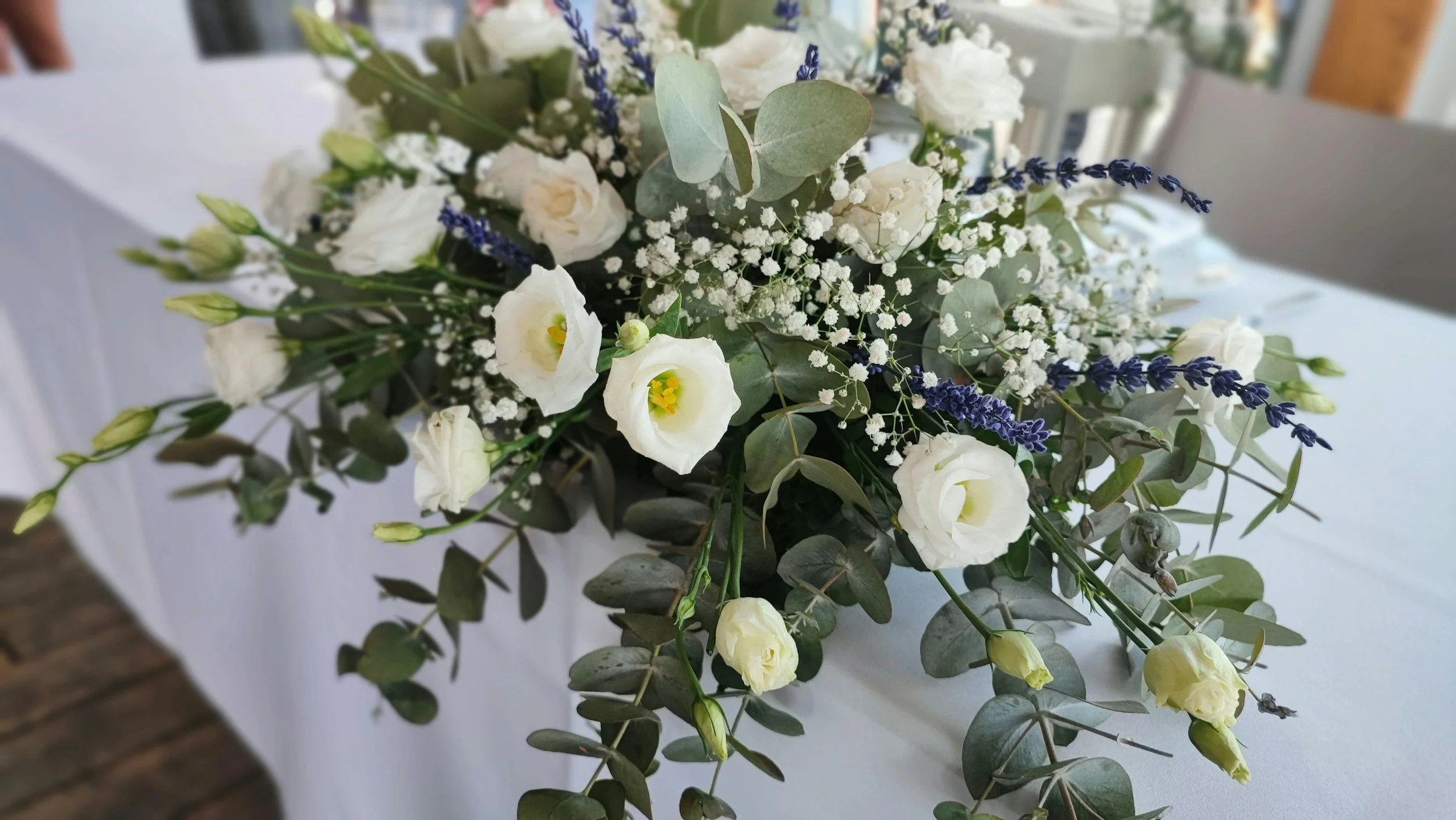 floral cloud arrangement with baby's breath and white flowers
