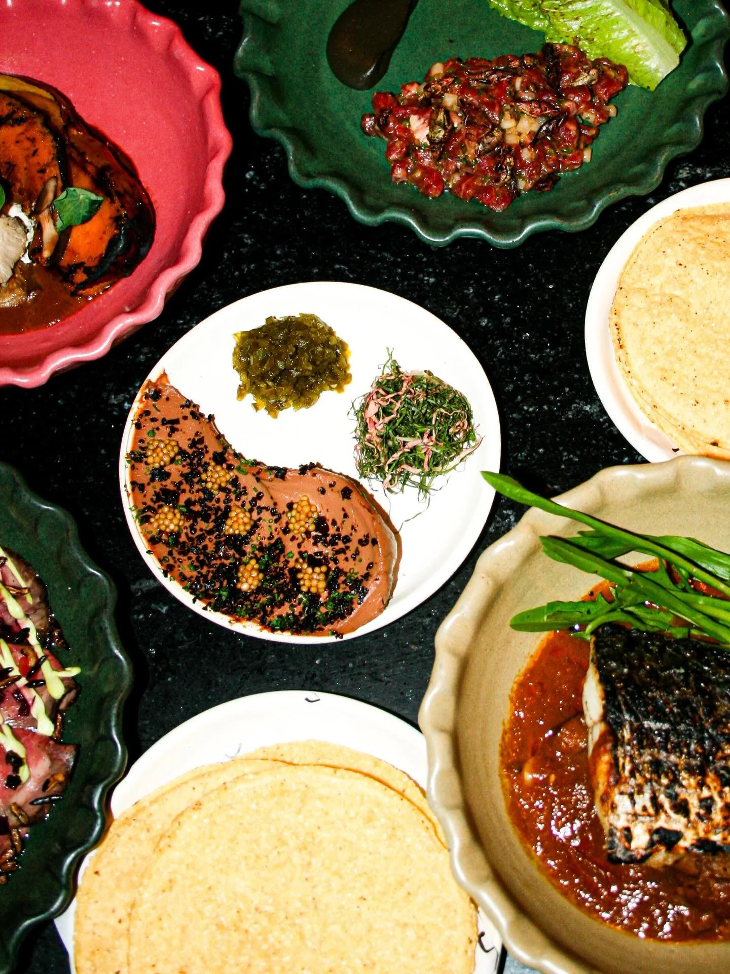 Chicken Liver Mousse, Pickled Mustard Seeds, Jalape&ntilde;o Relish with fresh Tostadas.
On a recent visit to the Farmer&rsquo;s market, it felt odd seeing the same winter produce alongside sunshine and people in shorts. Nevertheless, spring is aroun