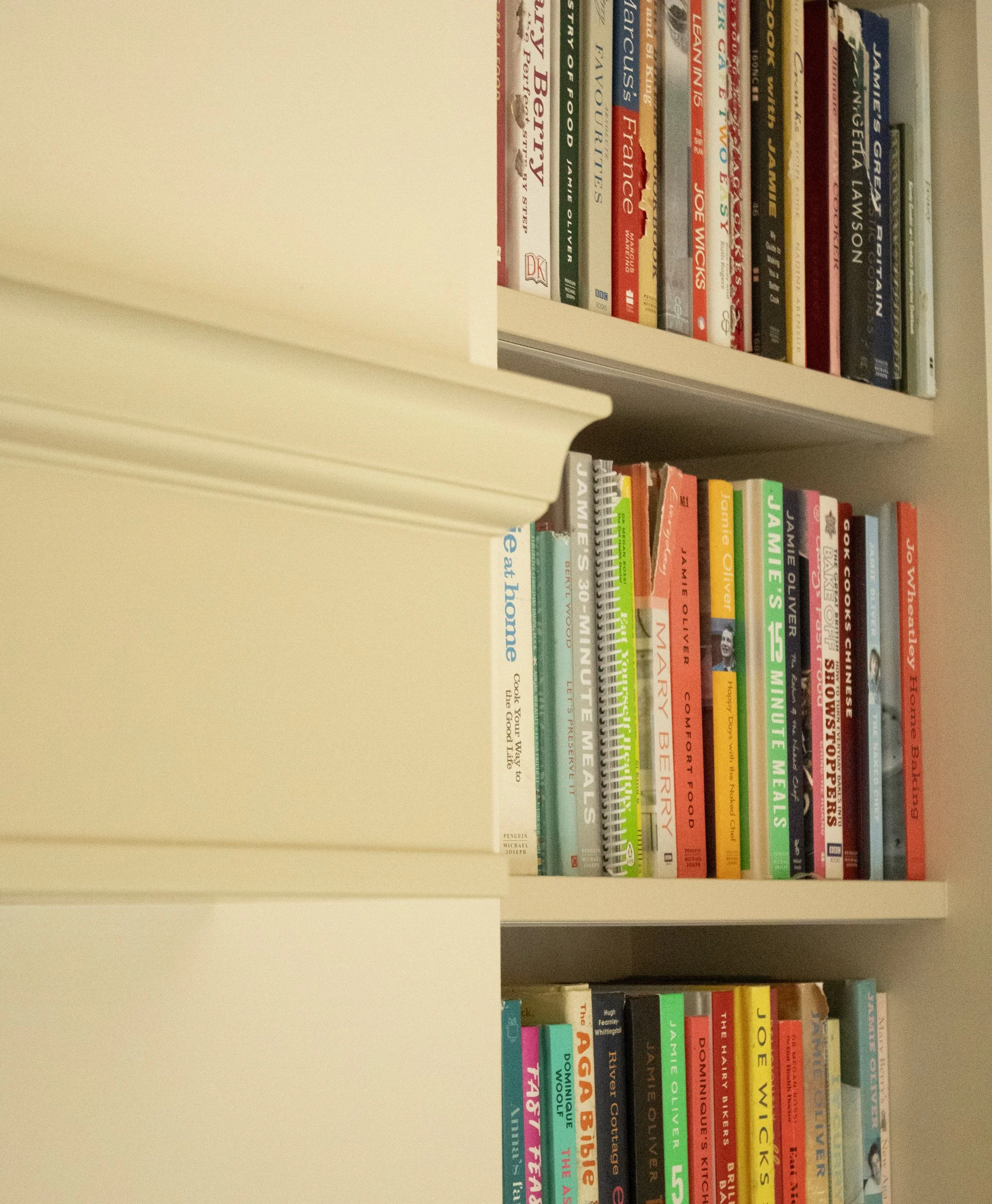 Bookshelves filled with colorful children's and young adult books, with titles about popular authors and themes.