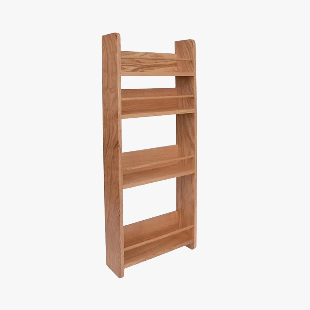 A wooden bookshelf with five shelves against a white background.