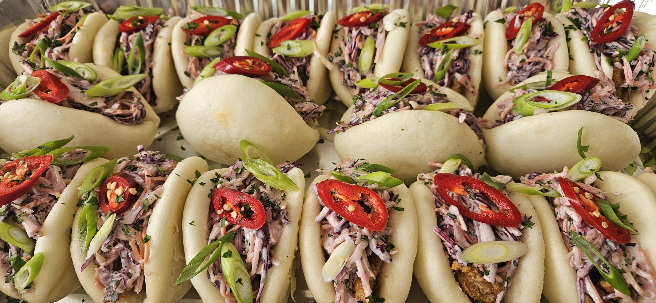 Chicken Bao bun with siopao sauce & coleslaw